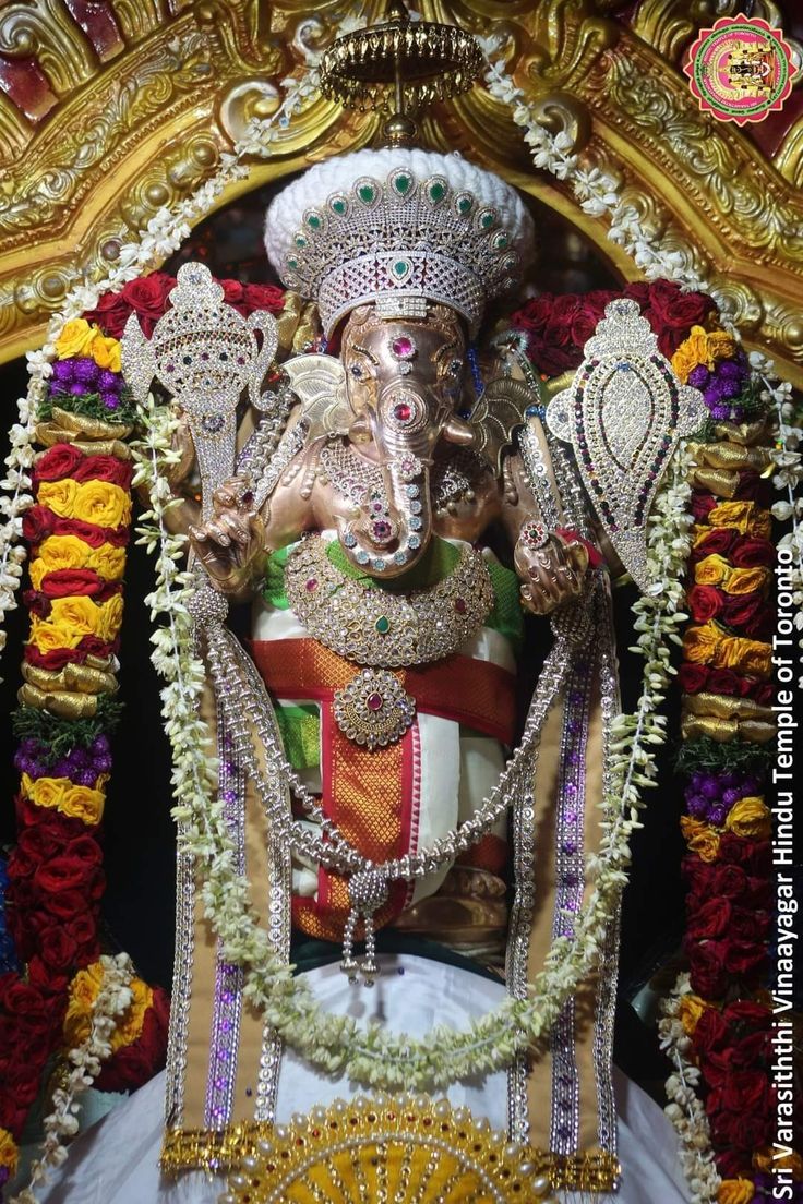 736x1104 Lord Ganesha Statue Surrounded by Flowers and Garlands. Subramanya swamy and ganesh, Karpaga vinayagar hd