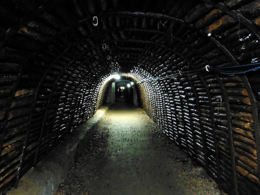 1024x768 A tunnel with a light at the end of it. Mine open pit