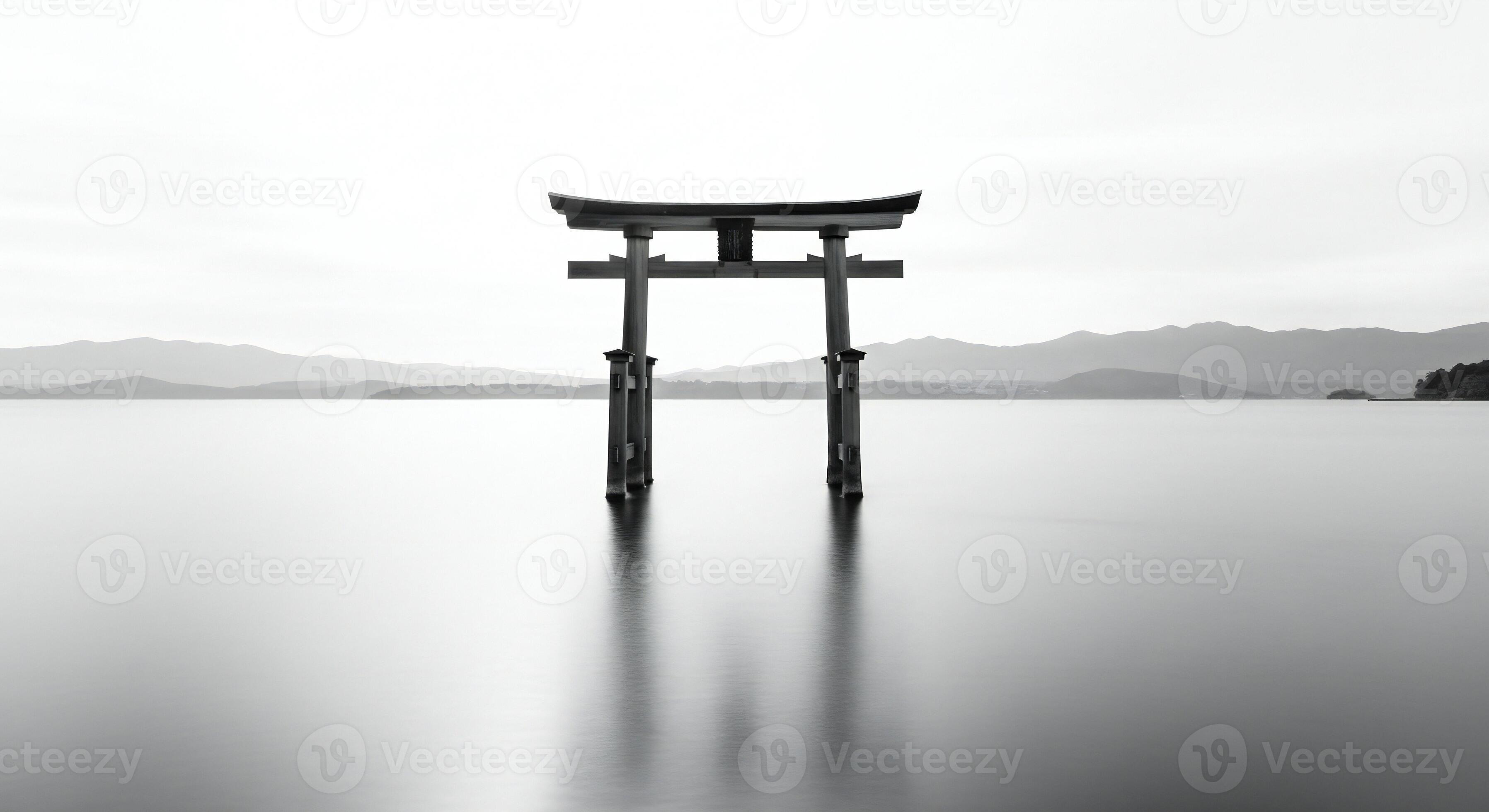 3593x1960 Nature background, Nature wallpaper, Monochromatic torii gate structure stands in calm water with distant mountains under an overcast sky