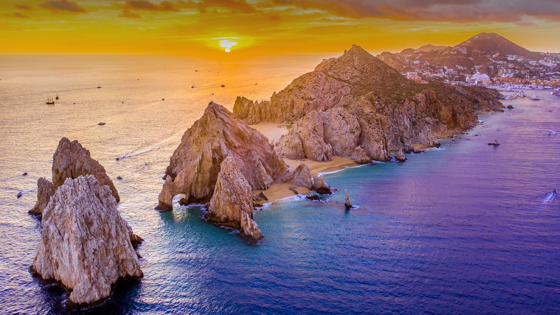 1920x1080 Aerial view of Lands End at Cabo San Lucas during sunset, Baja California Sur, Mexico. Windows Spotlight Image