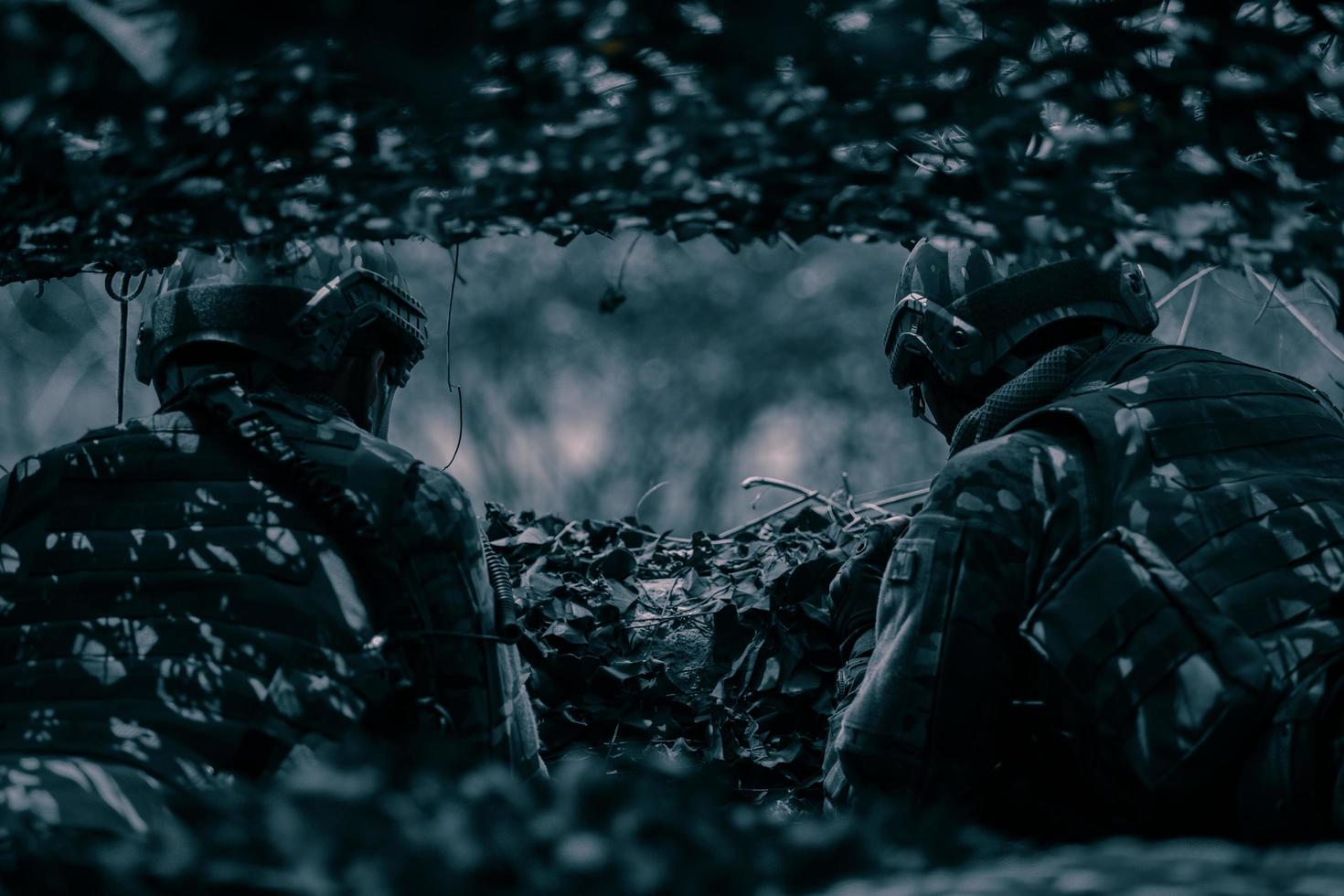 1470x980 rear view of soldiers on the battlefield, Military Staging Base, Mission in Progress, In the forest at night