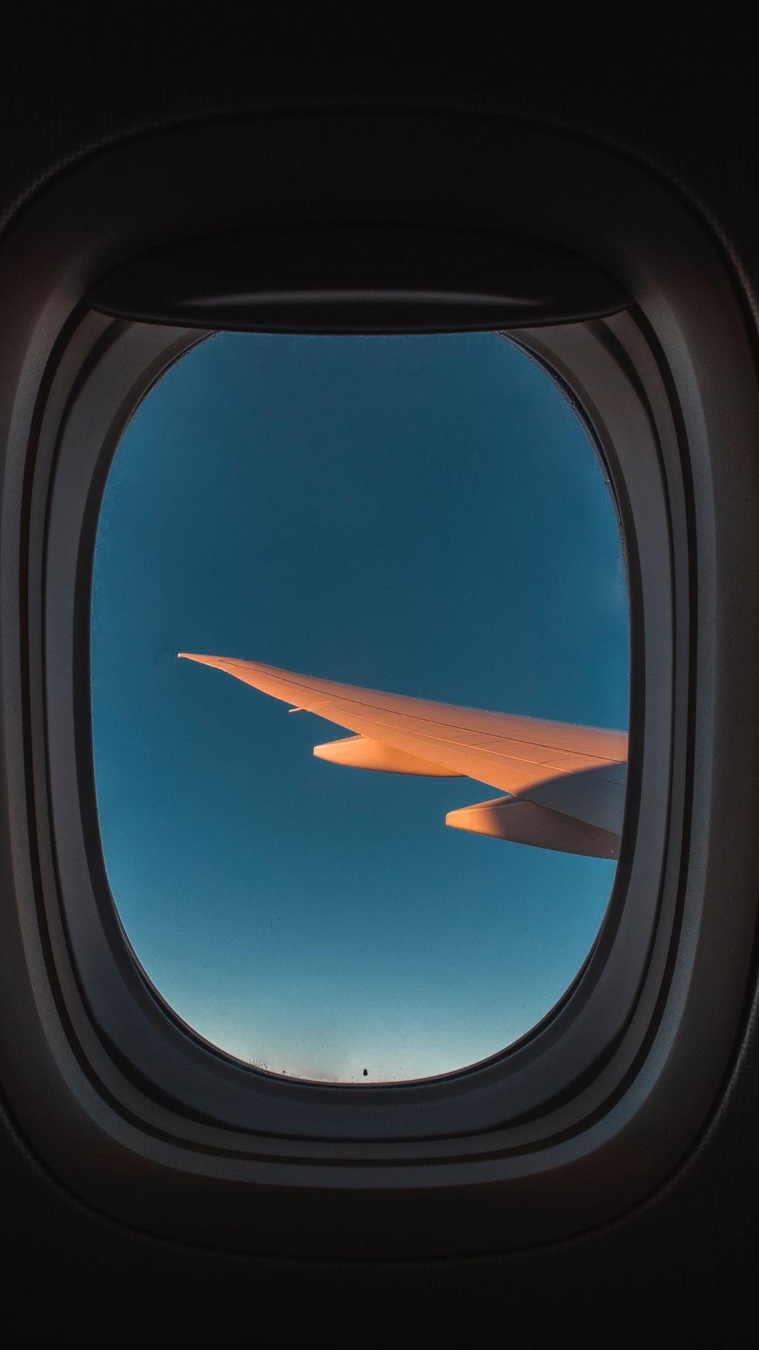 1080x1920 Wallpaper airliner, airline, wing, air travel, blue