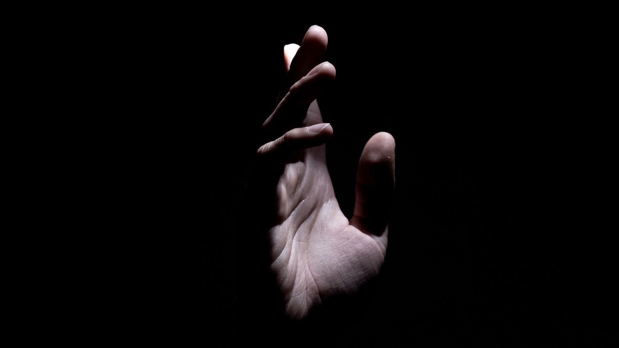 2048x1152 Download wallpaper 2048x1152 hand, fingers, dark background, palm