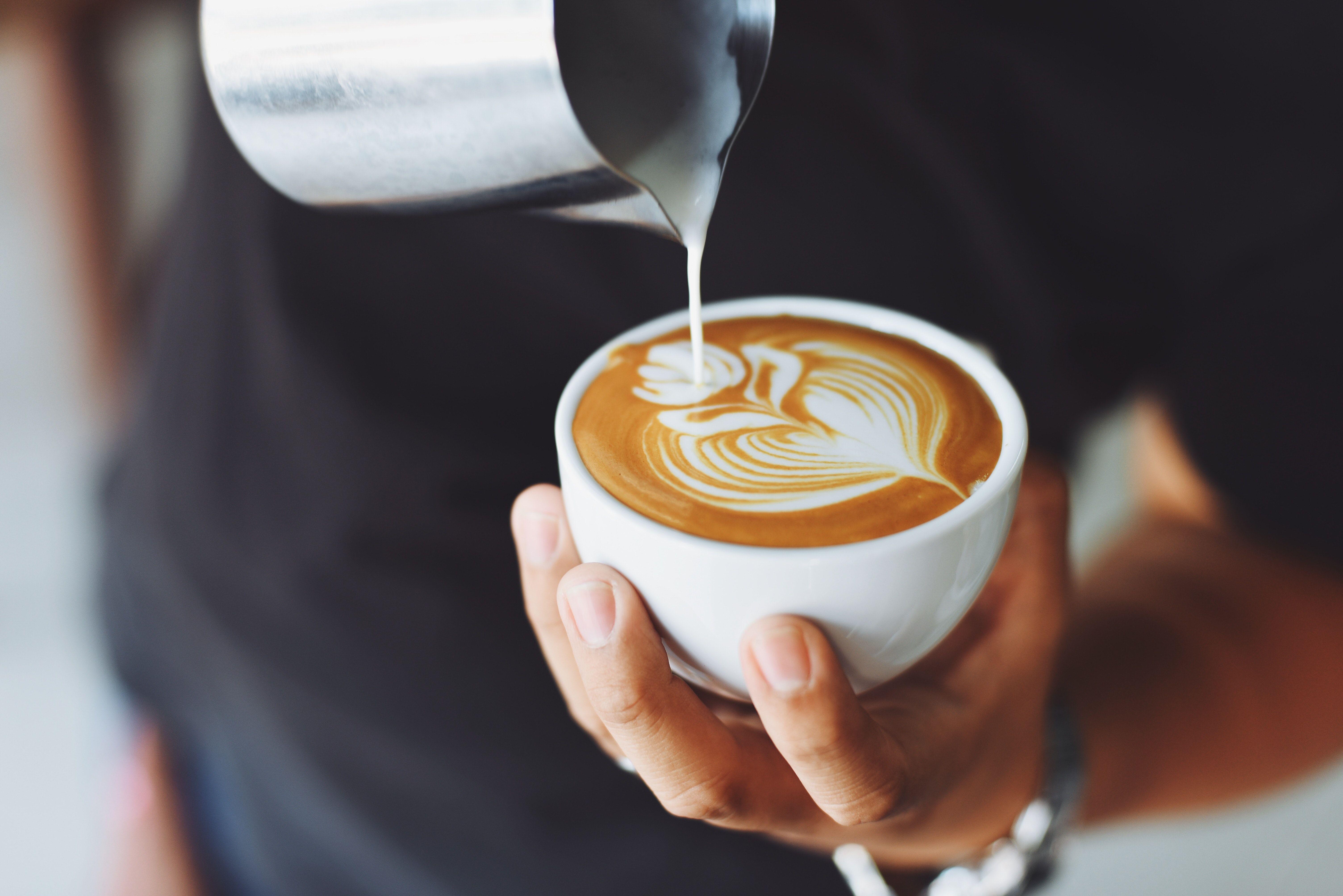 6016x4016 Person Performing Coffee Art · Free