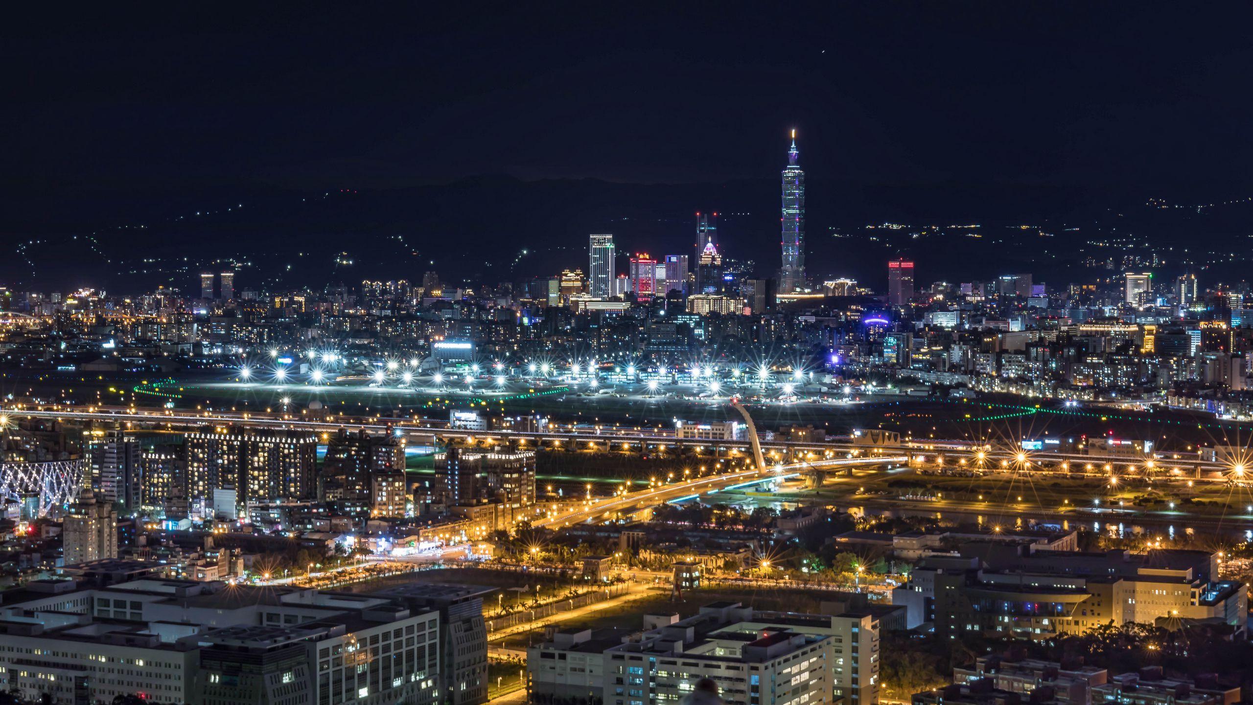 2560x1440 Download wallpaper 2560x1440 night city, top view, skyscrapers