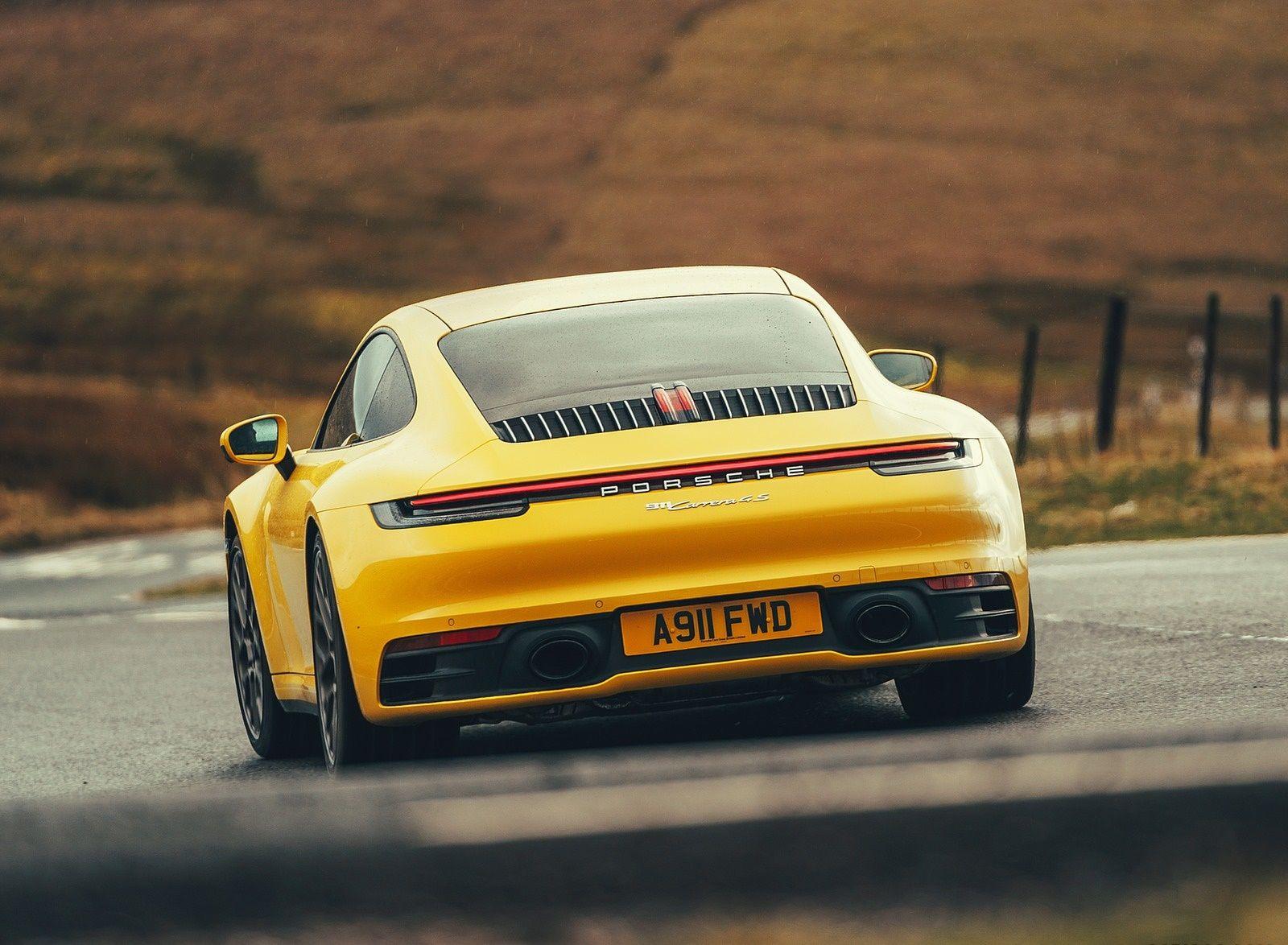 1600x1174 Porsche 911 (992) Carrera 4S (UK Spec) Rear Wallpaper