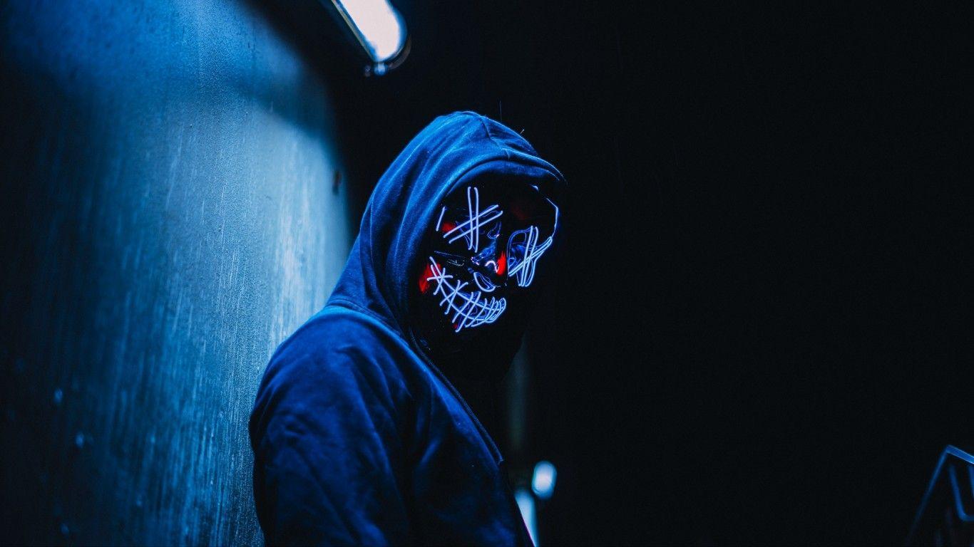 1366x768 Glowing mask at the dark HD Wallpaper 1366x768 Wallpaper