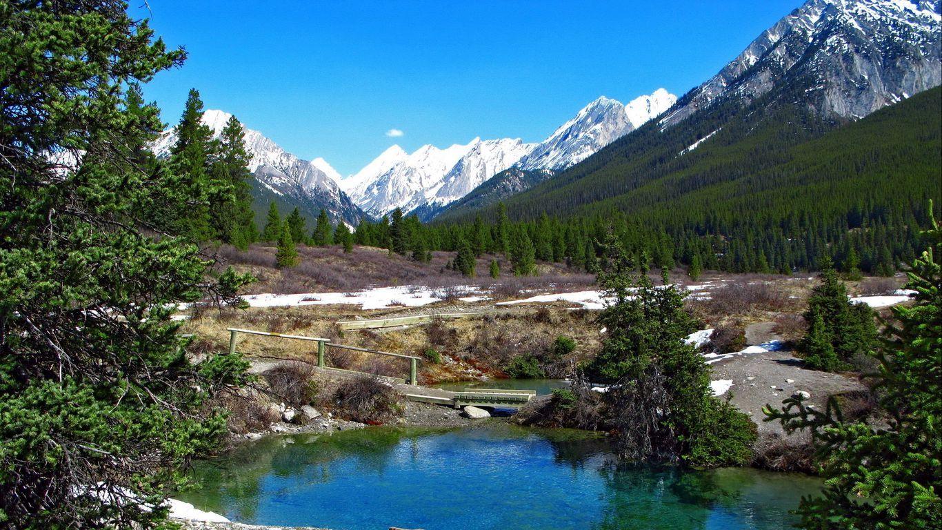1366x768 Download wallpaper 1366x768 mountains, snow, spring, top tablet