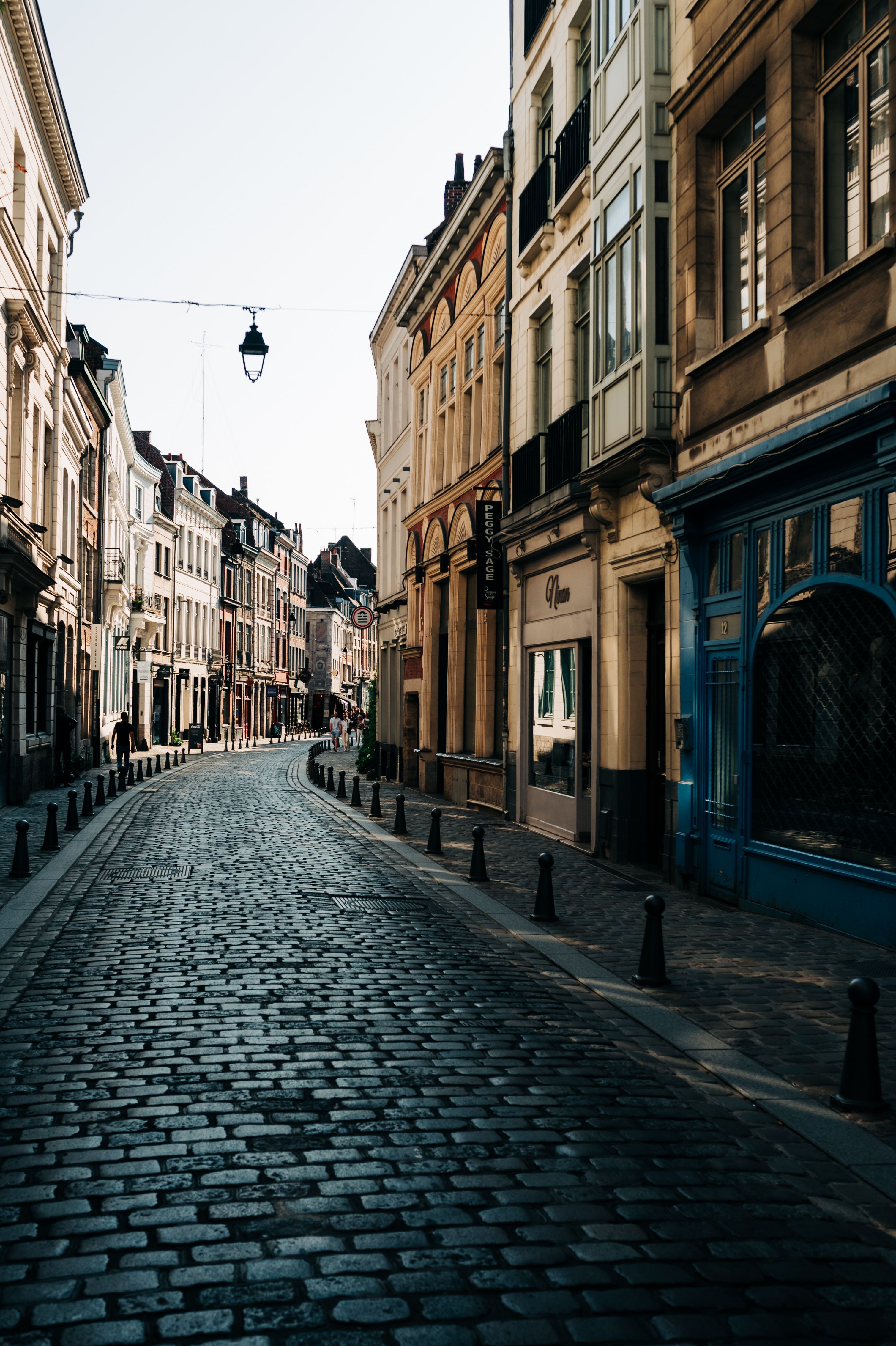 3016x4528 View of a Cobblestone Alley between Buildings in a French City · Free