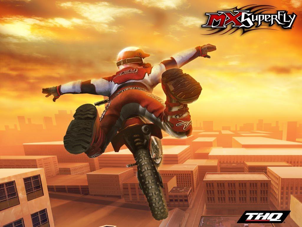 1024x768 MX Superfly Featuring Ricky Carmichael (2002) promotional art