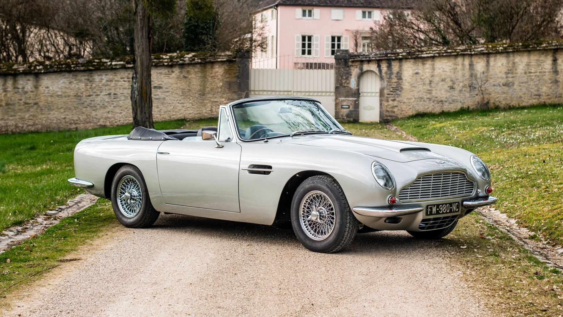 1920x1080 Aston Martin DB6 Volante MKI. The Concorso d'Eleganza Villa d'Este Auction 2026. Broad Arrow Auctions. Driven by Hagerty. Classic Car Auctions