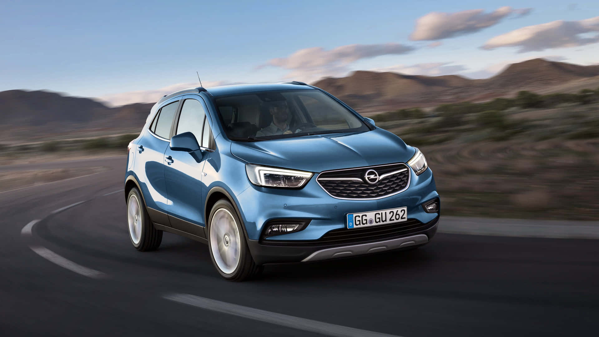 1920x1080 Download Sleek Opel Mokka on the Road Wallpaper