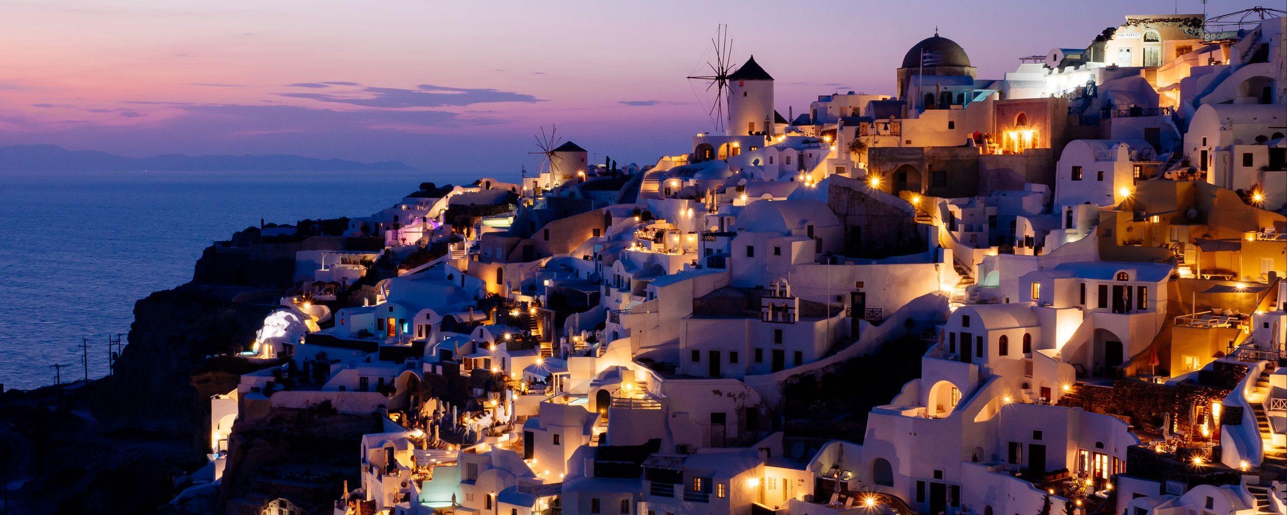 2560x1024 Download wallpaper 2560x1024 city, resort, sunset, architecture