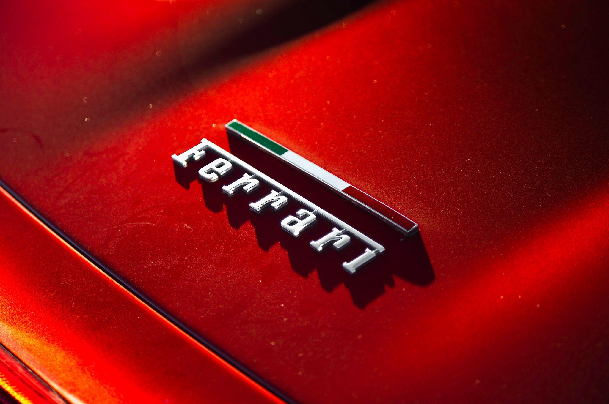 2048x1360 Ferrari Car Logo Wallpaper