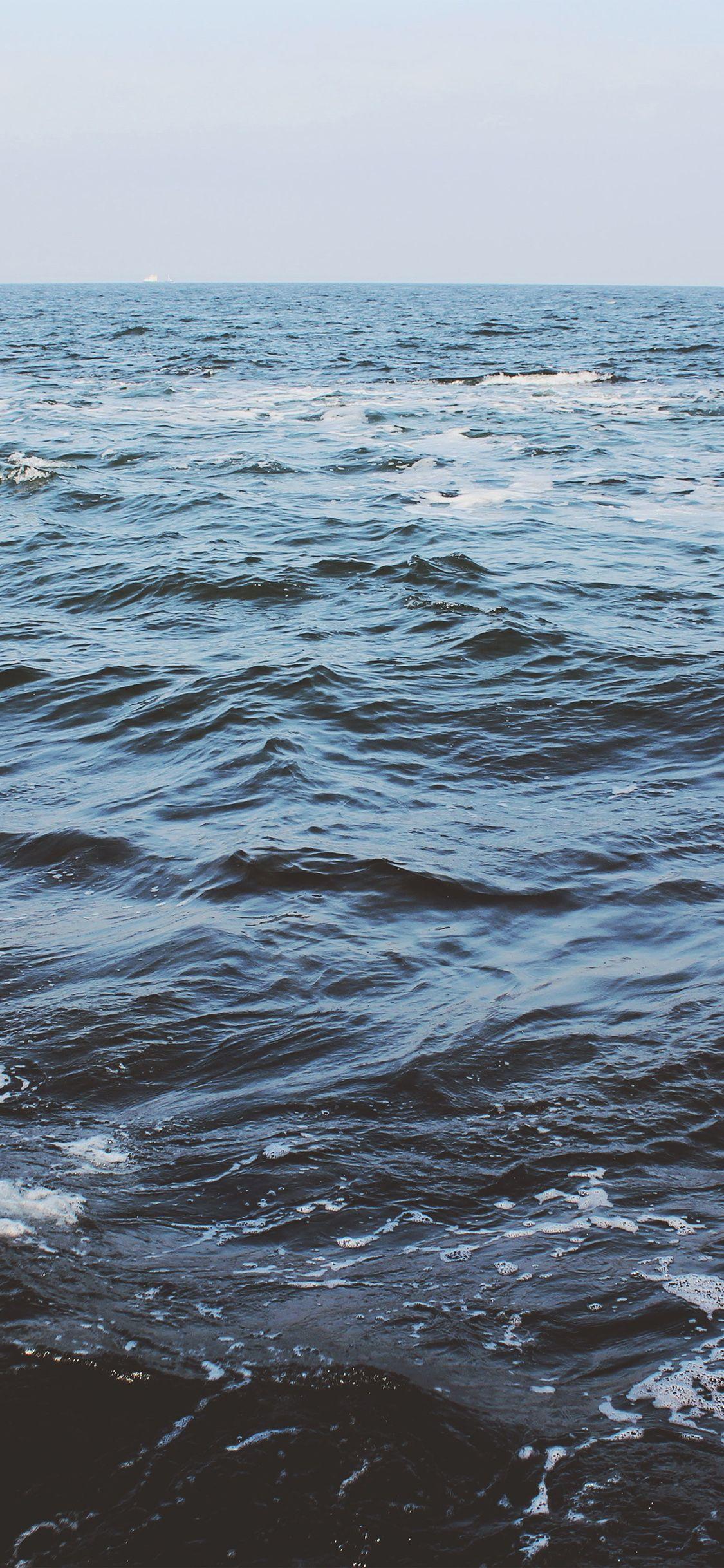 1125x2436 Sea Water Beach Nature Blue Wave Wallpaper