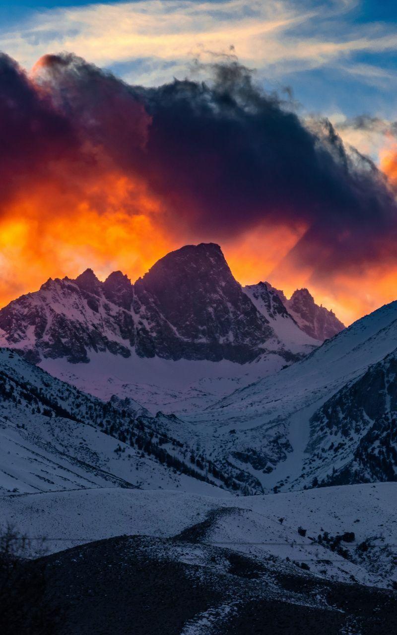 800x1280 Mountains, yellow glow, snow layer, glacier, sunset, glow