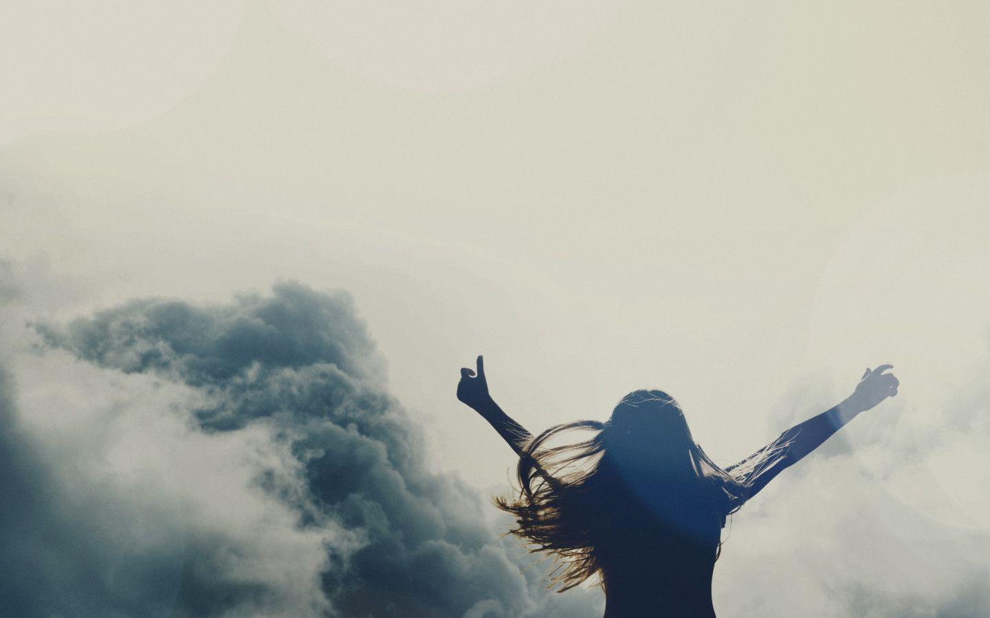 1440x900 Download wallpaper: Girl silhouette above clouds 1440x900
