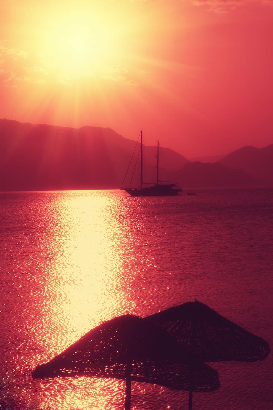 910x1365 HD wallpaper: yacht, sun, red, summer, tourism, journey, vacation, the sun behind the cloud