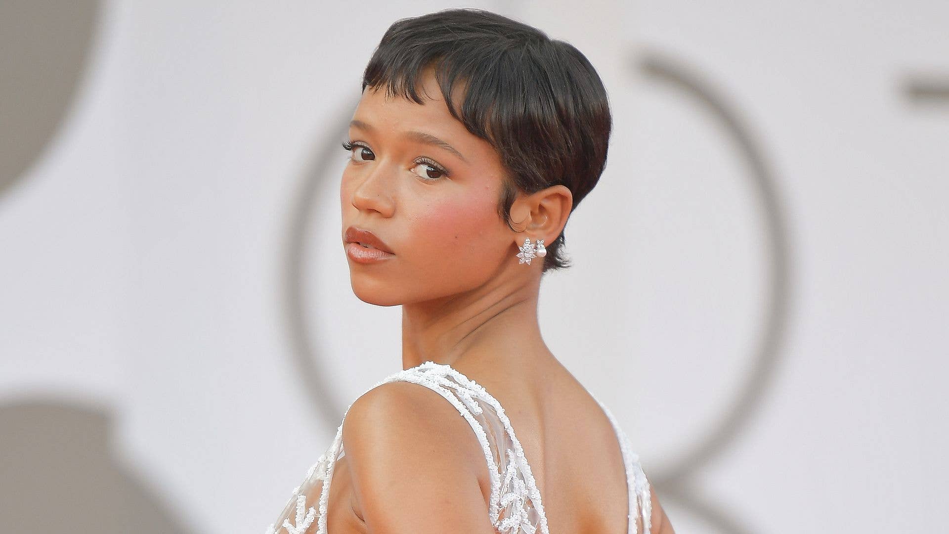 1920x1080 Taylor Russell shows Harry Styles what he's missing in bridal white gown
