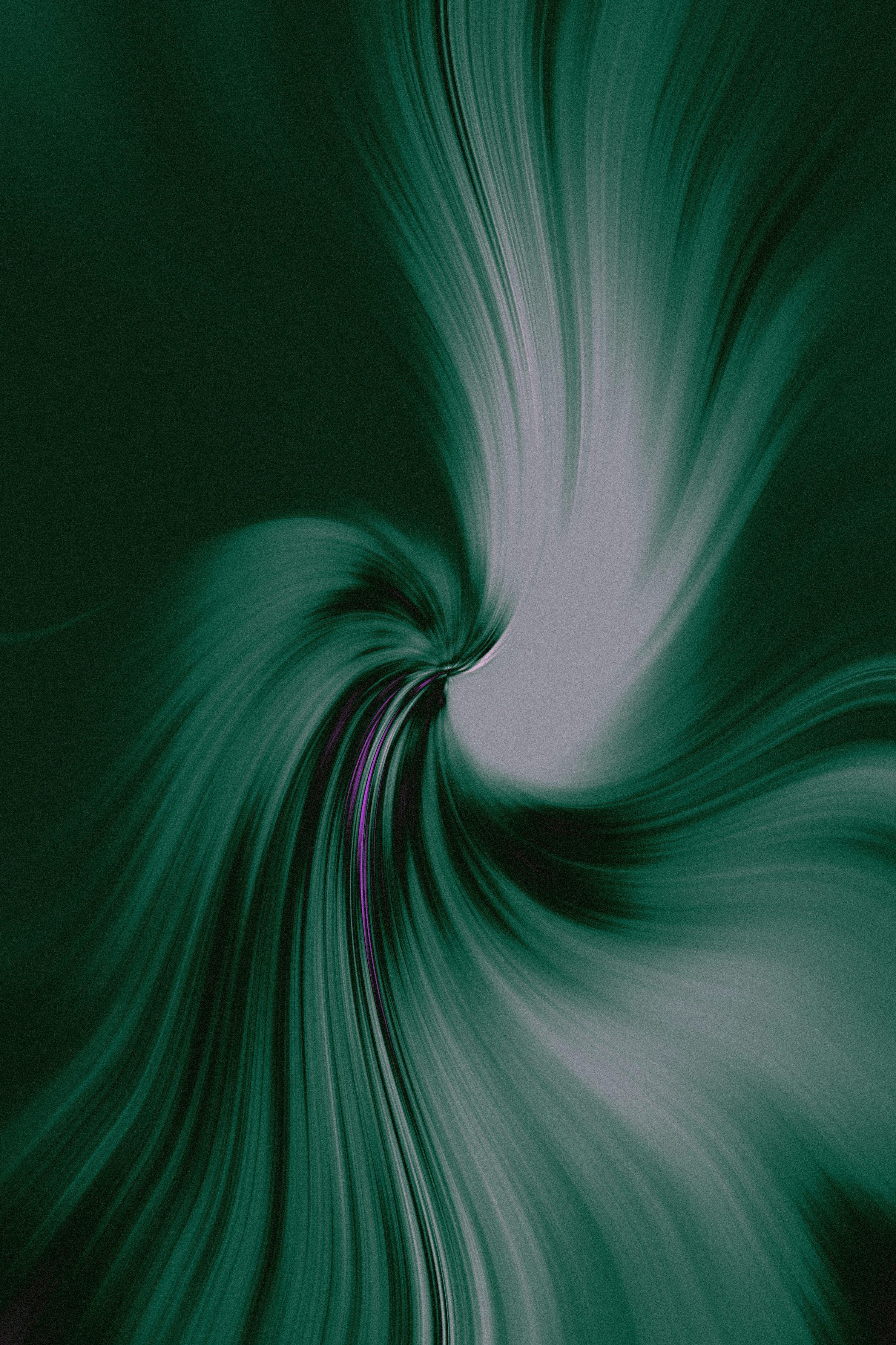 3000x4500 A green and white swirl with a black background photo