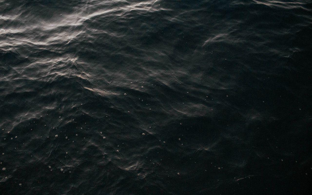 1280x800 Download wallpaper 1280x800 water, waves, dark, surface widescreen