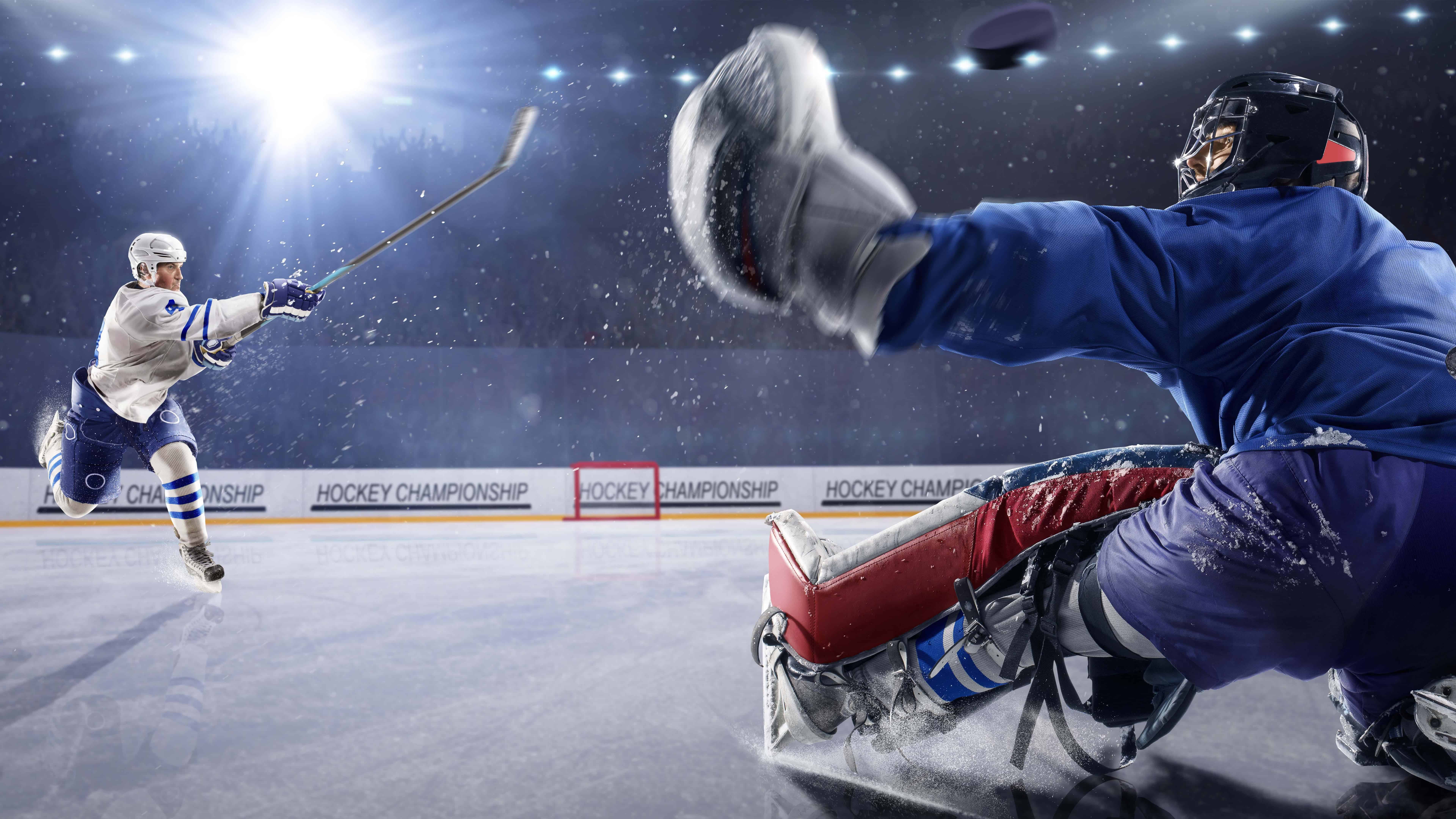 7680x4320 Hockey Player Shooting Puck At Goalie UHD 8K Wallpaper