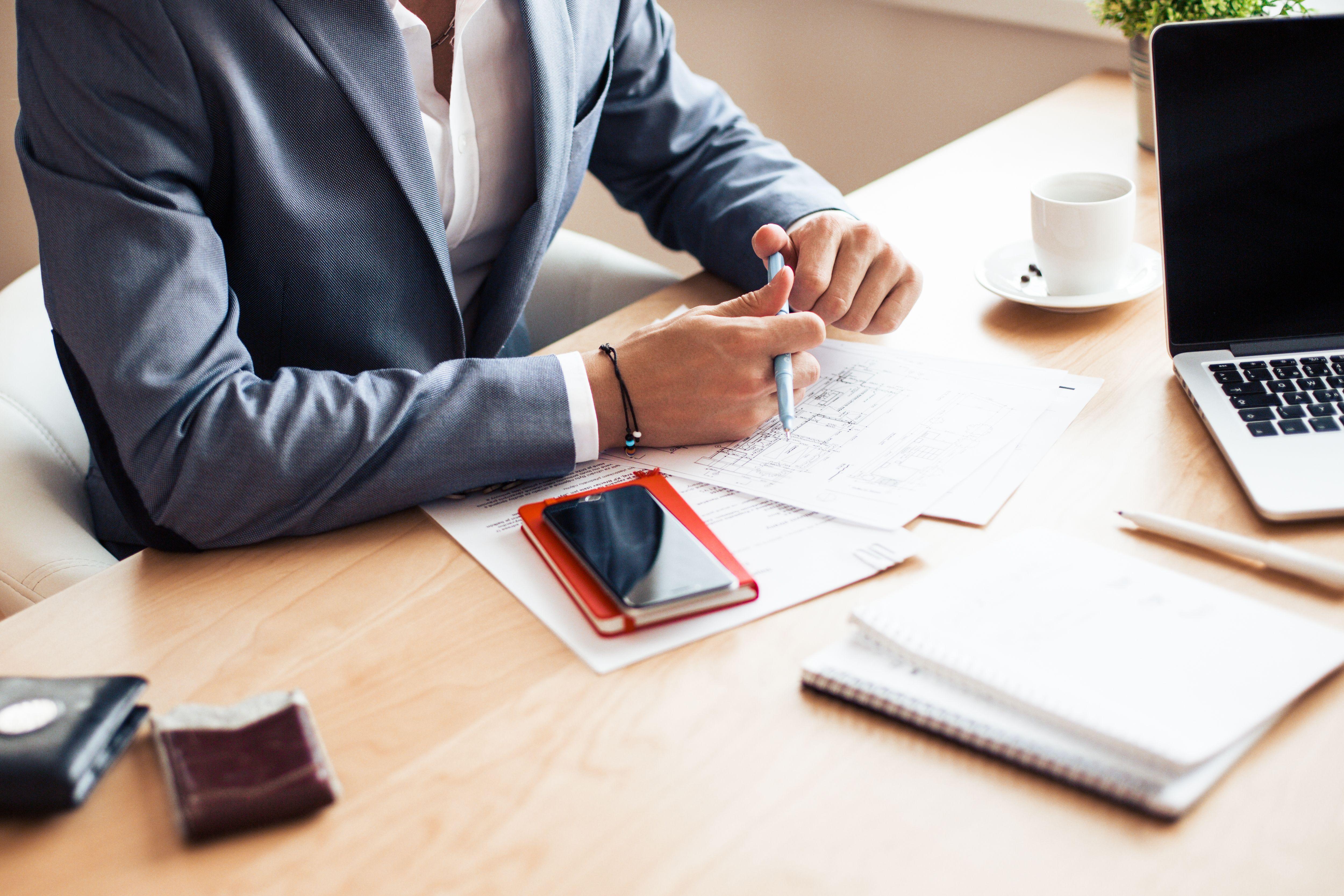 5000x3333 Man Wearing Blue Blazer on Business Meeting Free