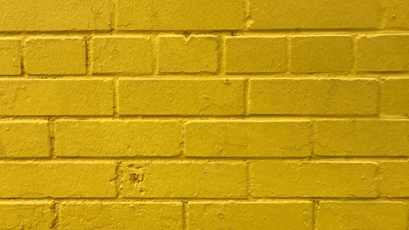 1366x768 Yellow Laptop Wallpaper