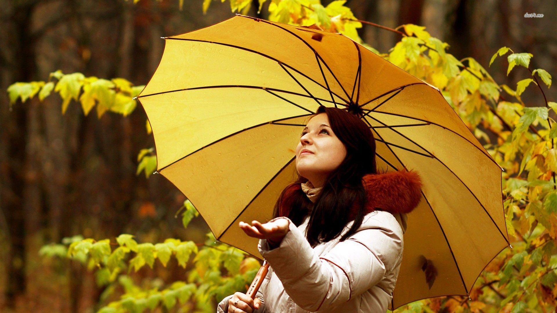 1920x1080 Lovely girl catches drops of autumn rain wallpaper and image