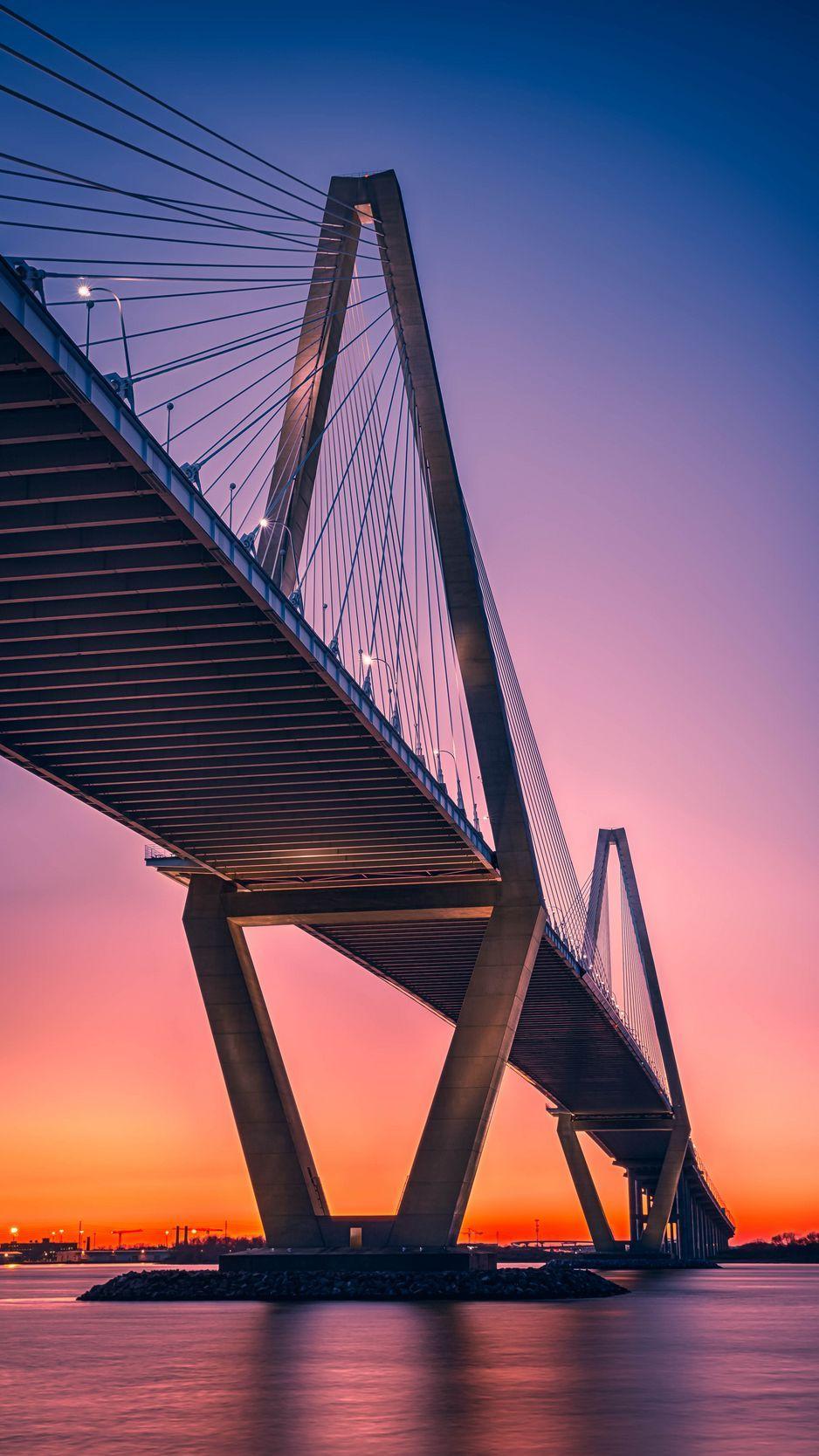 938x1668 Download wallpaper 938x1668 bridge, architecture, sunset