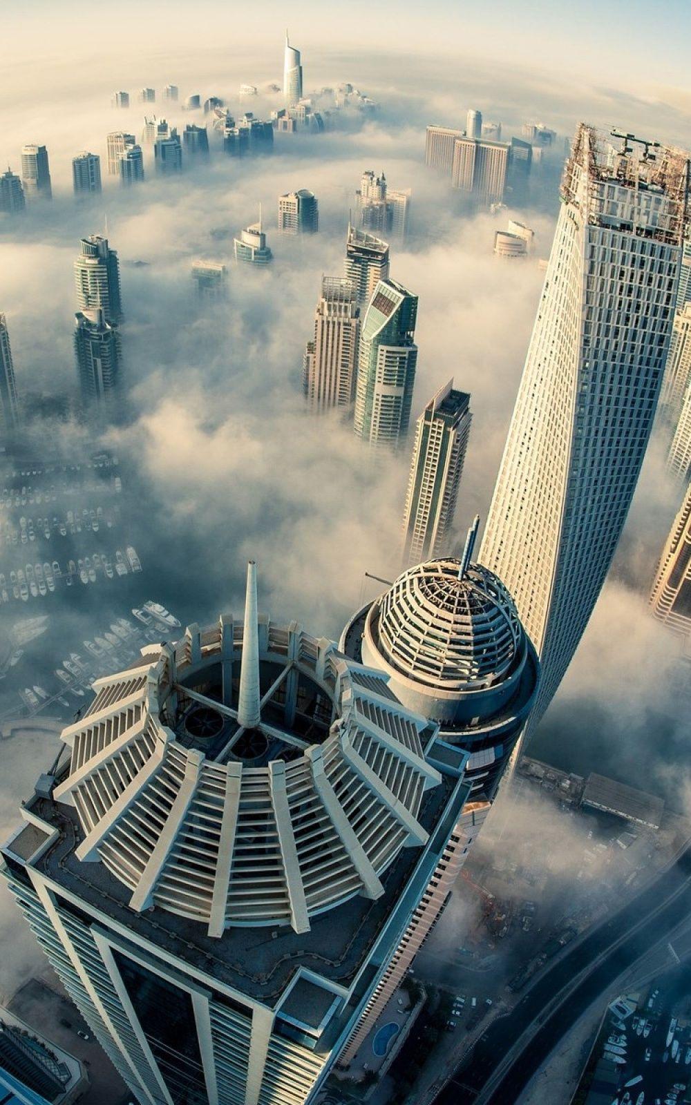 1000x1600 Cityscapes Foggy Dubai Skyline Android Wallpaper free download