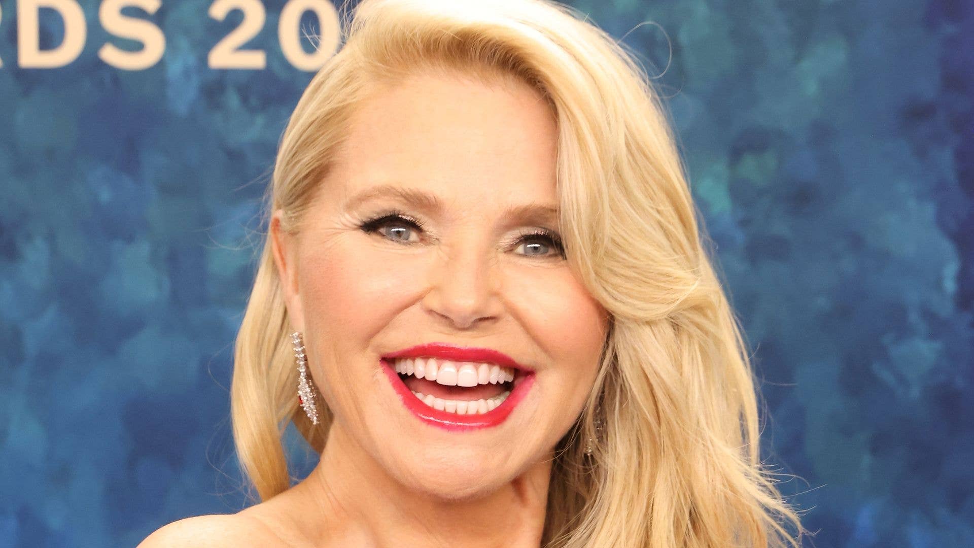 1920x1080 Christie Brinkley's swimsuit and gumboots combo at 71 will blow you away