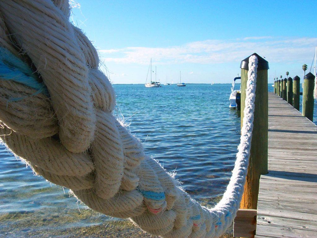 1024x768 Pier Water Rope And Ports Wallpaper