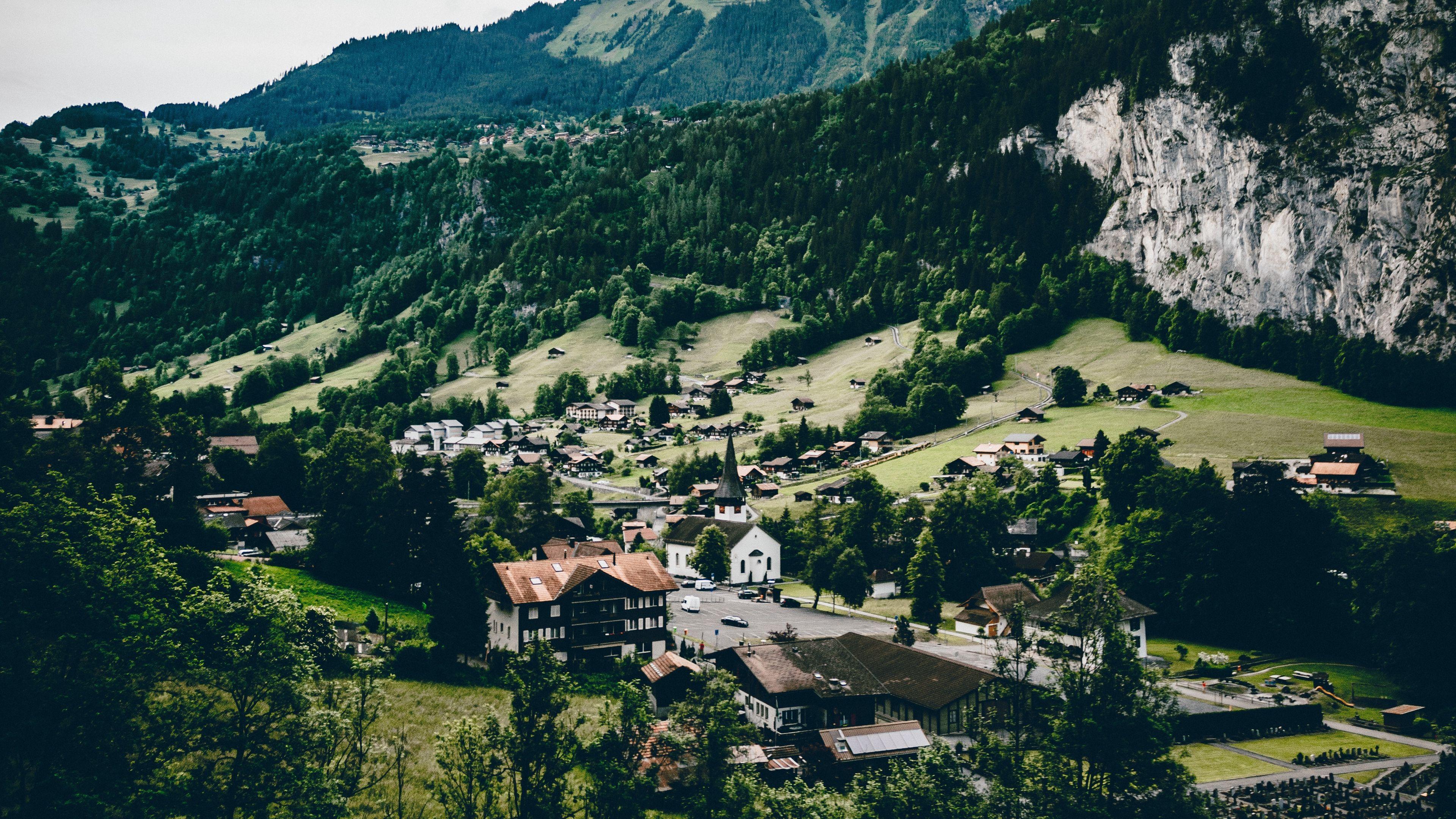 3840x2160 Wallpaper 4k village, mountains, view from above, lauterbrunnen, switzerland 4k Mountains, view from above, village
