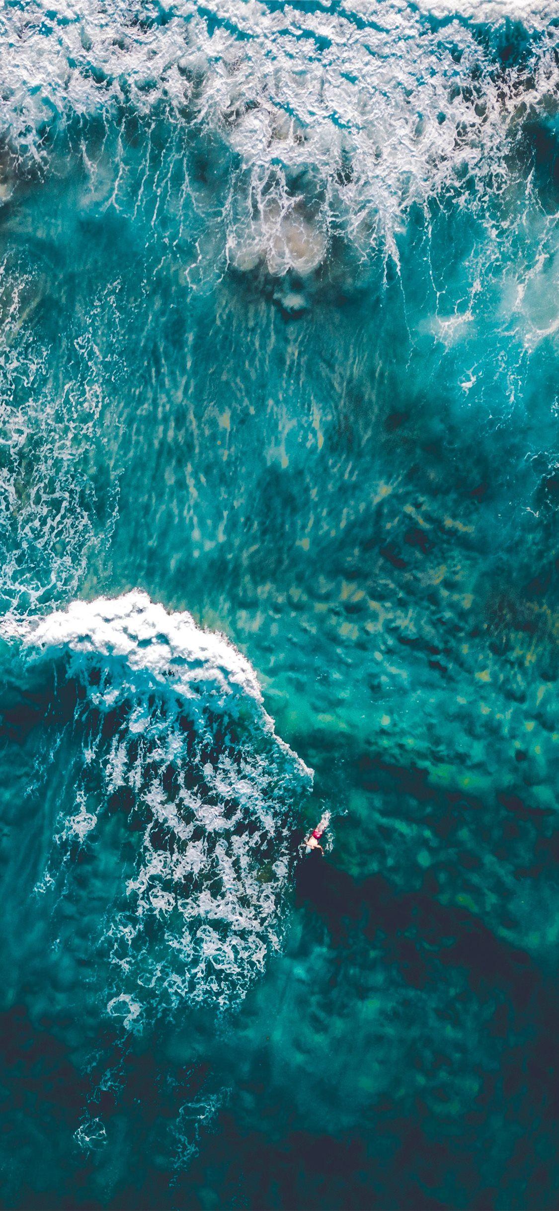 1125x2436 wavy ocean in aerial photography iPhone 11 Wallpaper Free Download