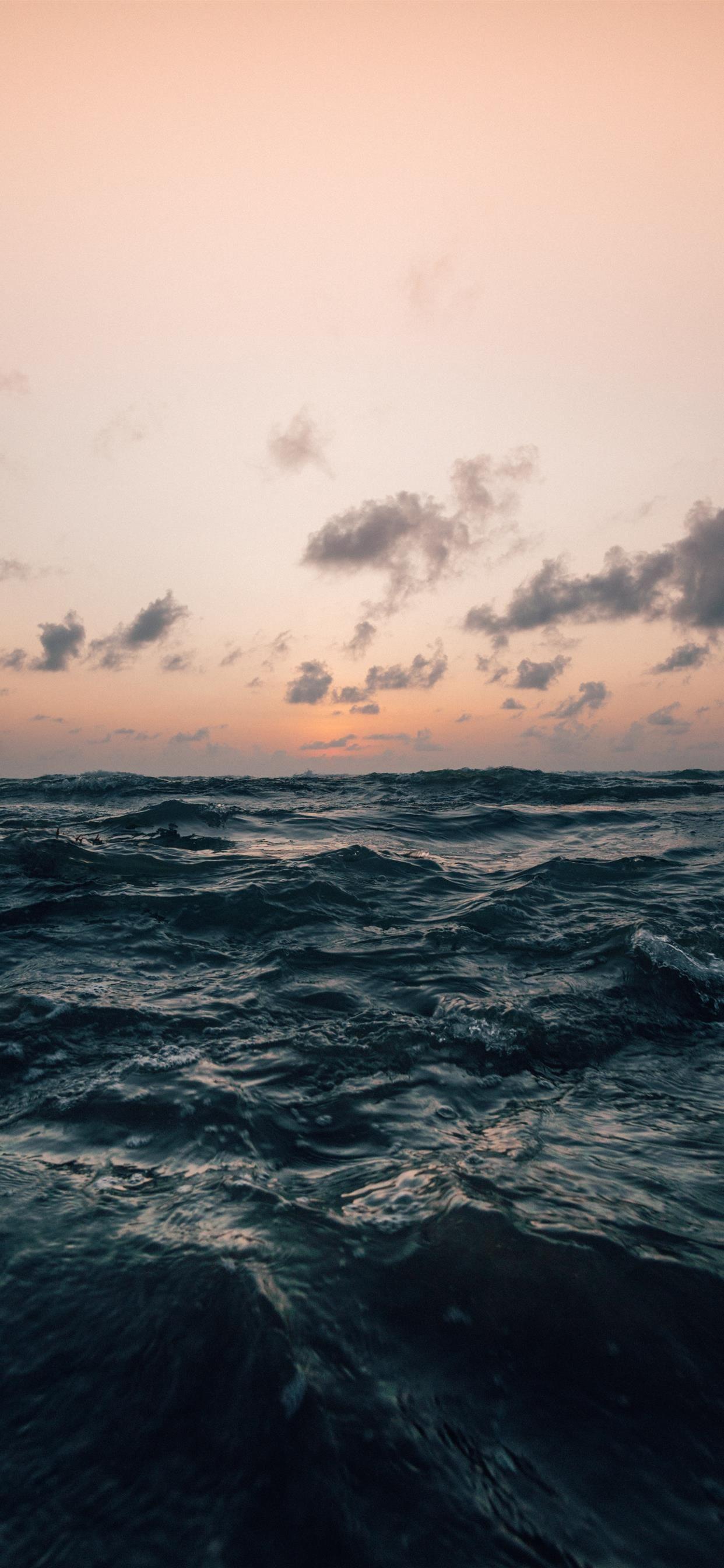 1242x2688 sea under cloudy sky in nature photography iPhone 11 Wallpaper