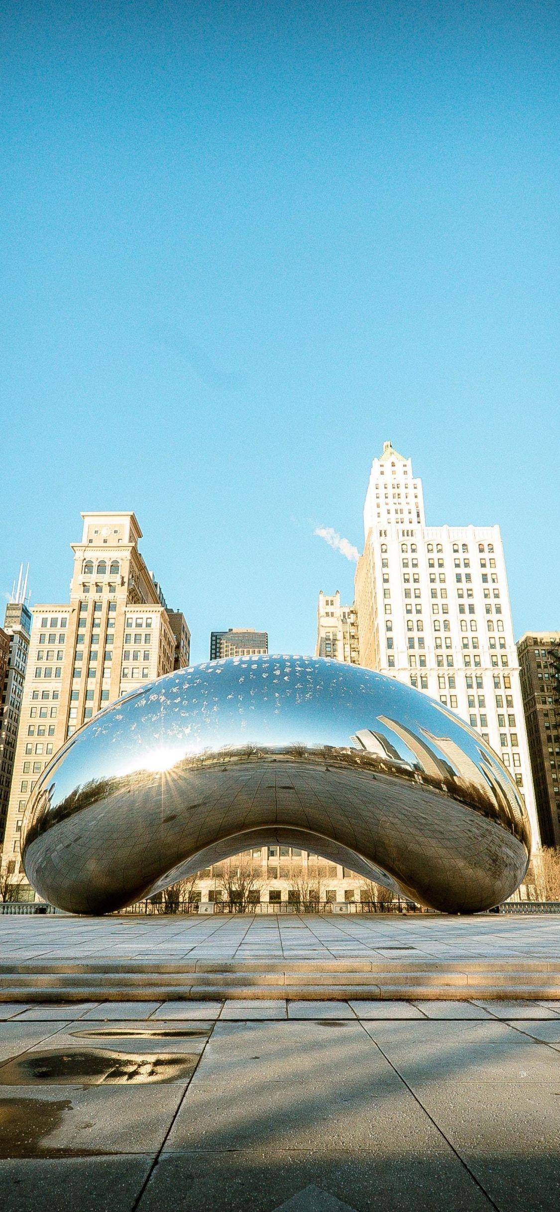 1125x2436 Download 1125x2436 wallpaper giant clouds, cloud gate, buildings