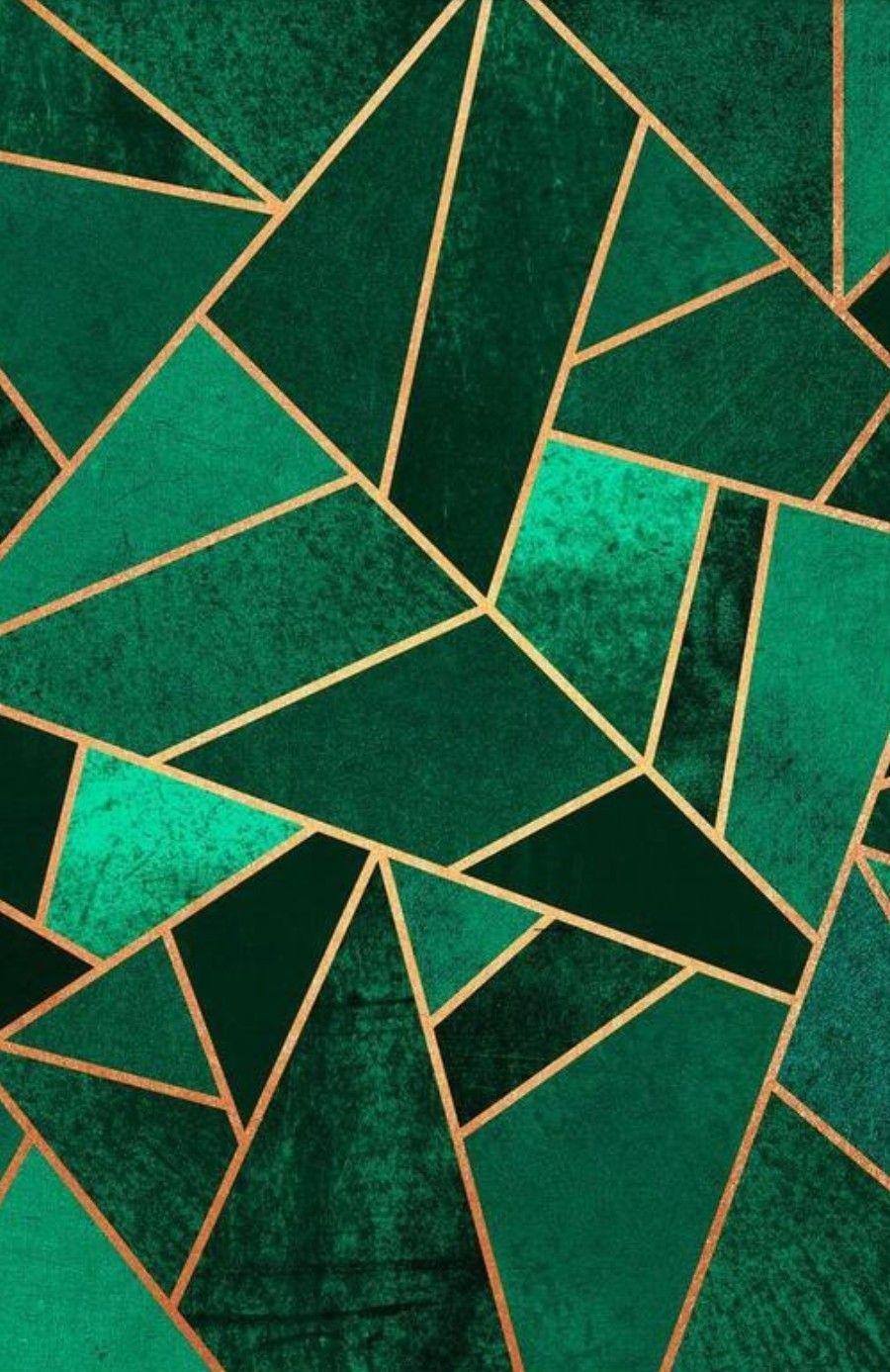 a green and gold art deco wallpaper with a black background and a gold  design on