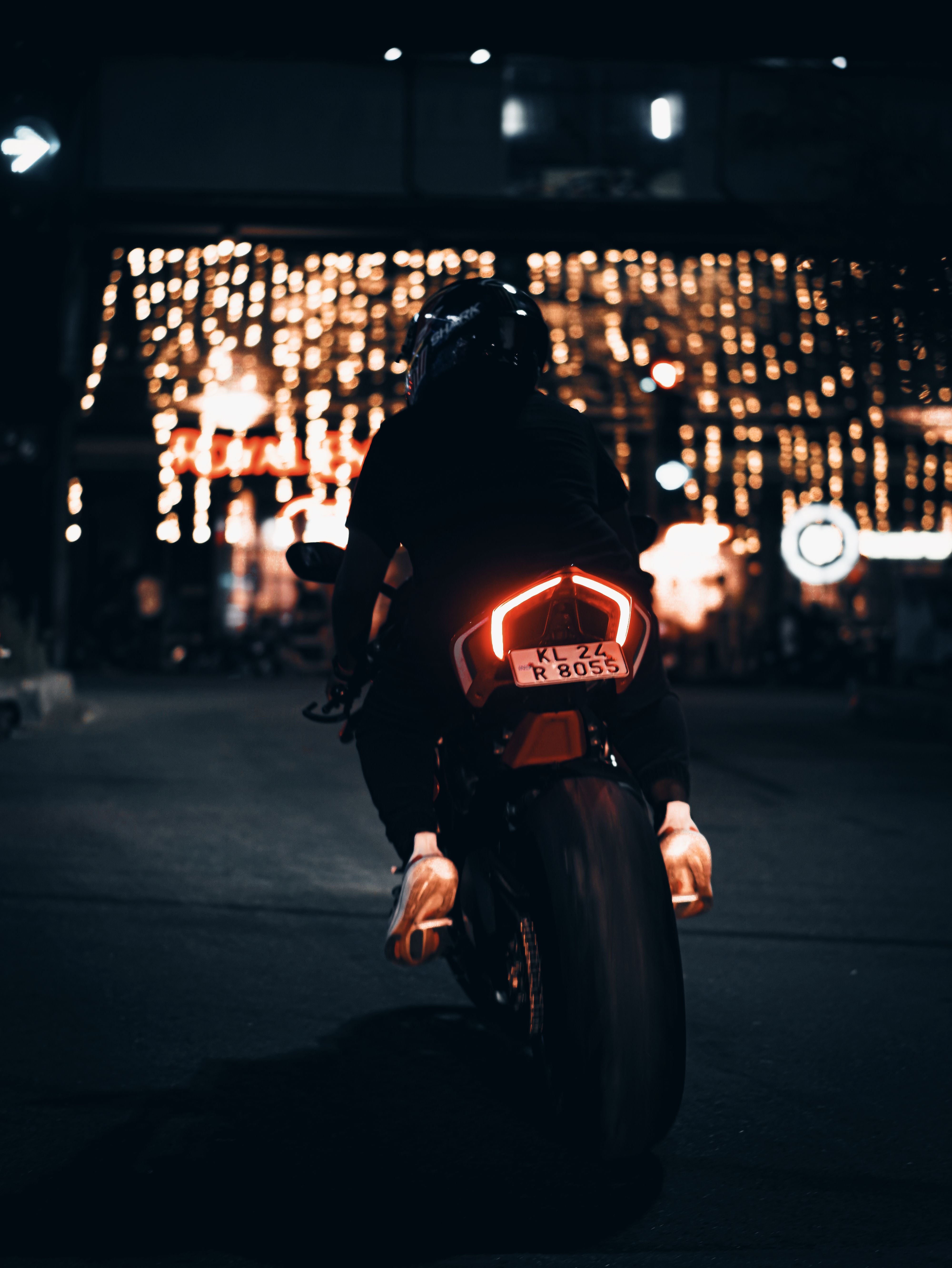 4000x5328 Night Ride on a Motorcycle Under City Lights · Free