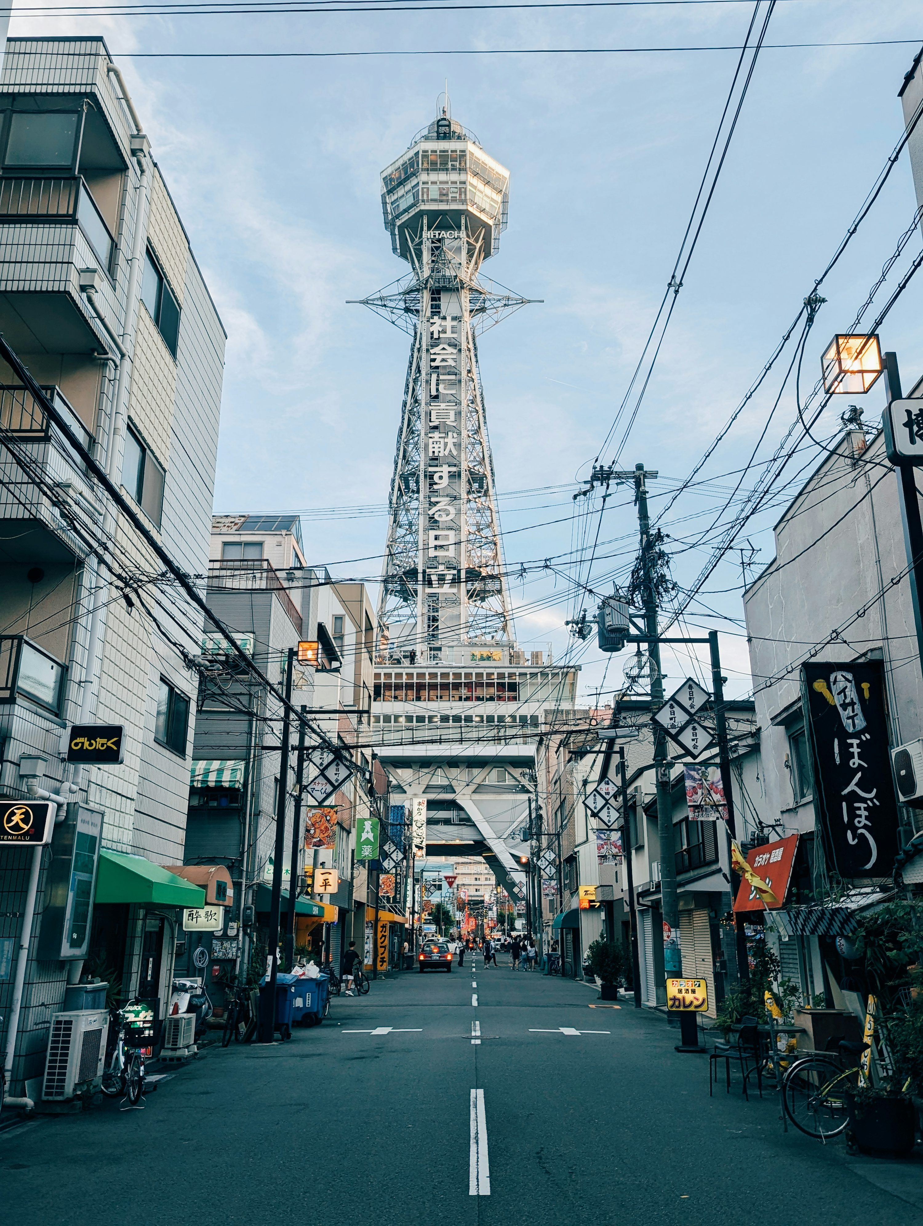 3000x3984 A city street with a tall tower in the background photo