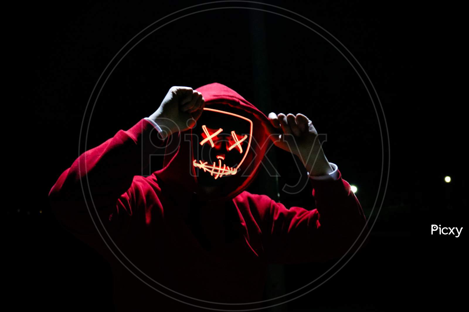 1600x1067 Image Of A Man Wearing A Red Hoodie With Red Glowing Mask In The Dark Background. Halloween And Horror Concept. PN634744 Picxy