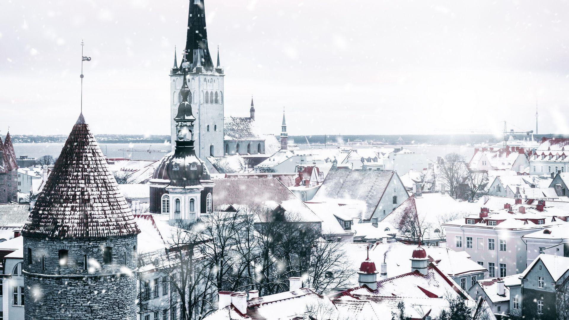 1920x1080 Download wallpaper 1920x1080 architecture, snowfall, winter, city