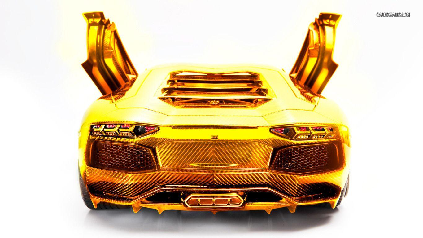 1366x768 Cool Gold Cars Wallpaper