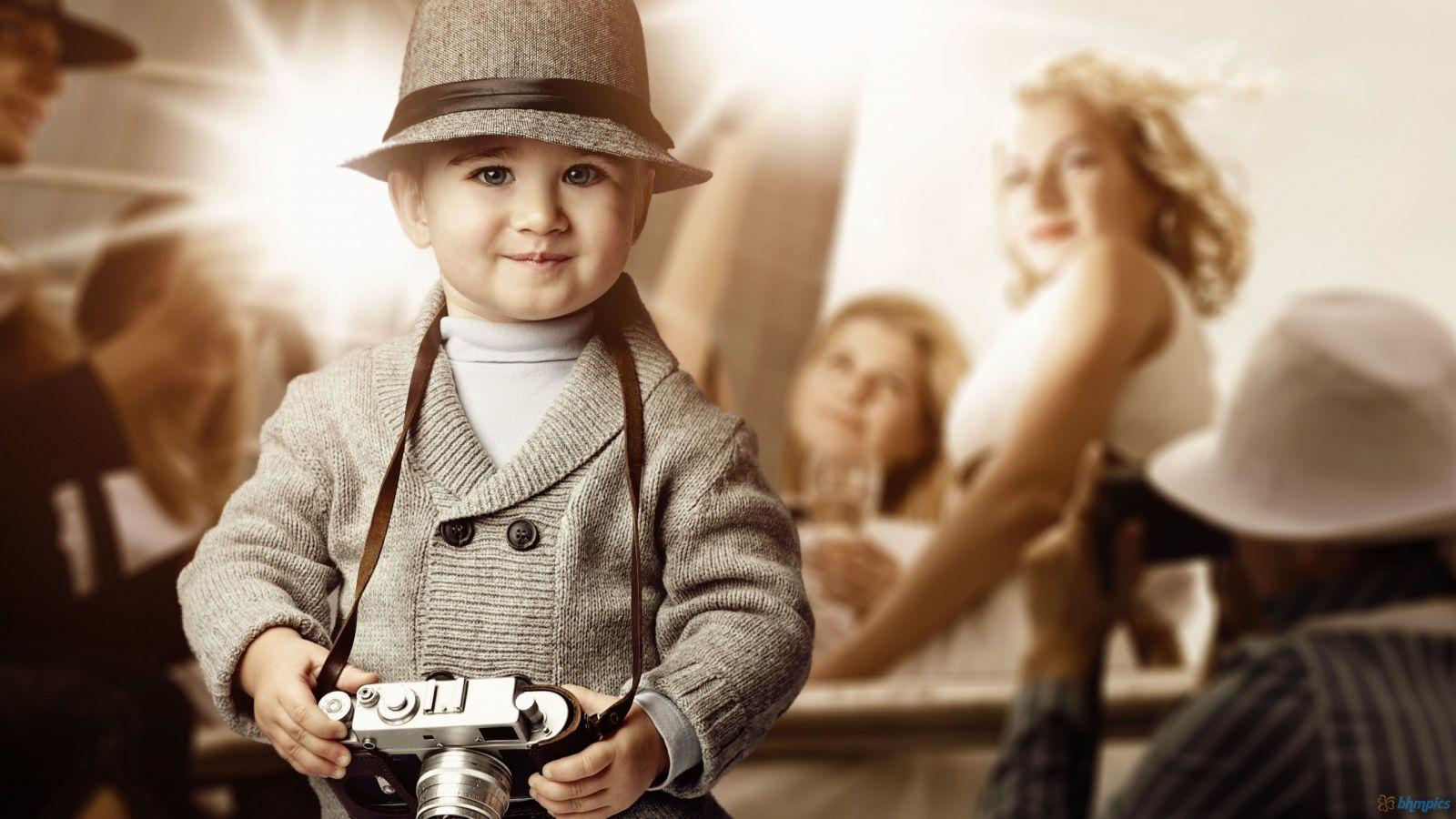 1600x900 Cute Boy Photographer Wallpaper