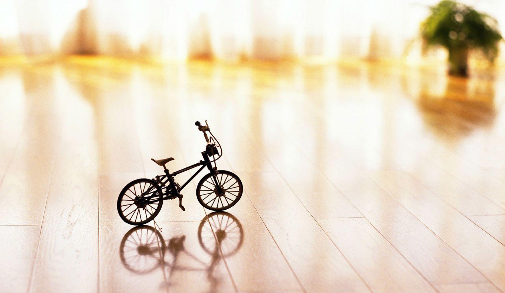 1764x1026 Mini Bicycles On The Table Wallpaper HD / Desktop and Mobile