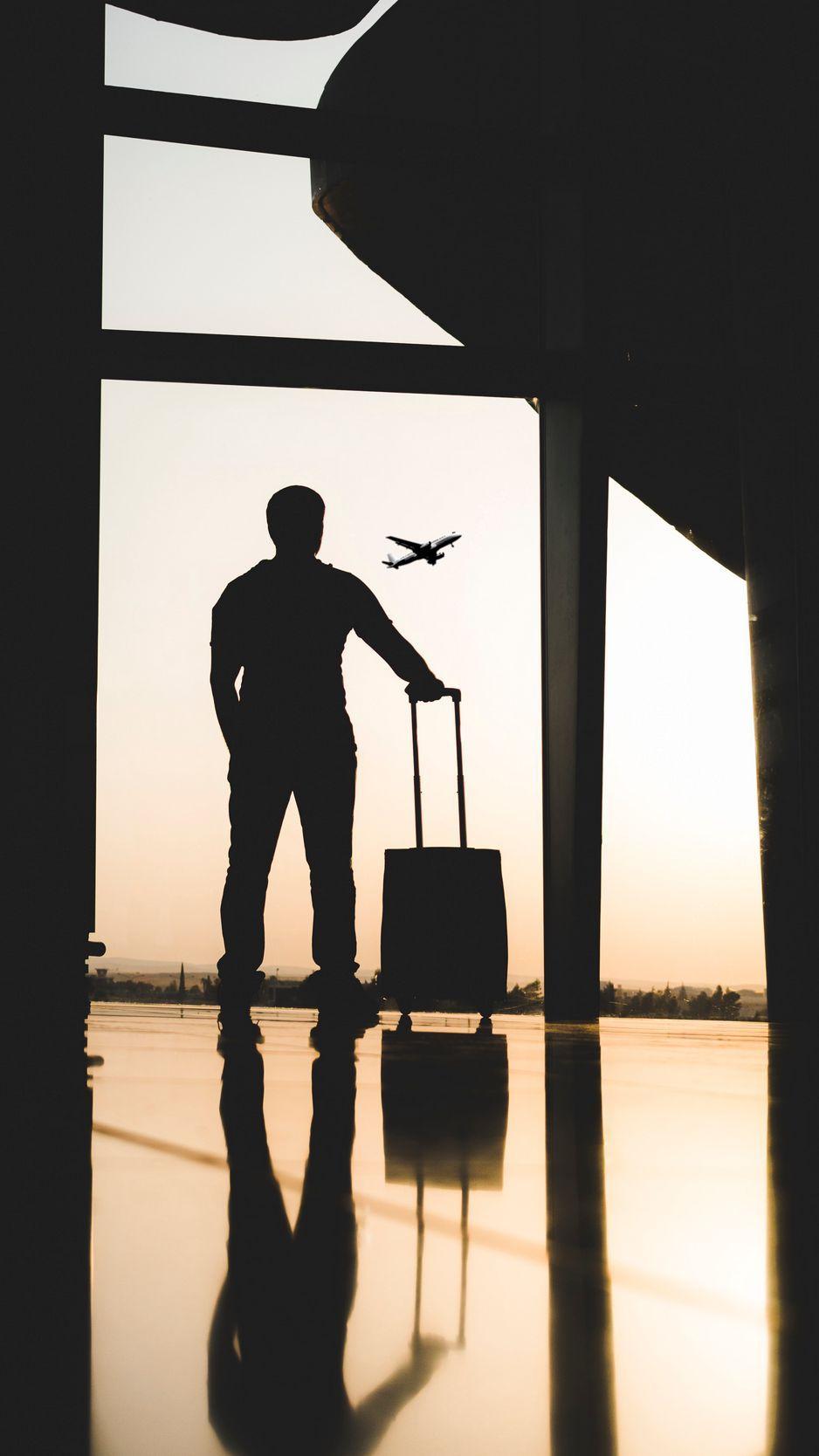 938x1668 Download Wallpaper 938x1668 Man, Silhouette, Airport, Travel, Suitcase Iphone 8 7 6s 6 For Parallax HD Background