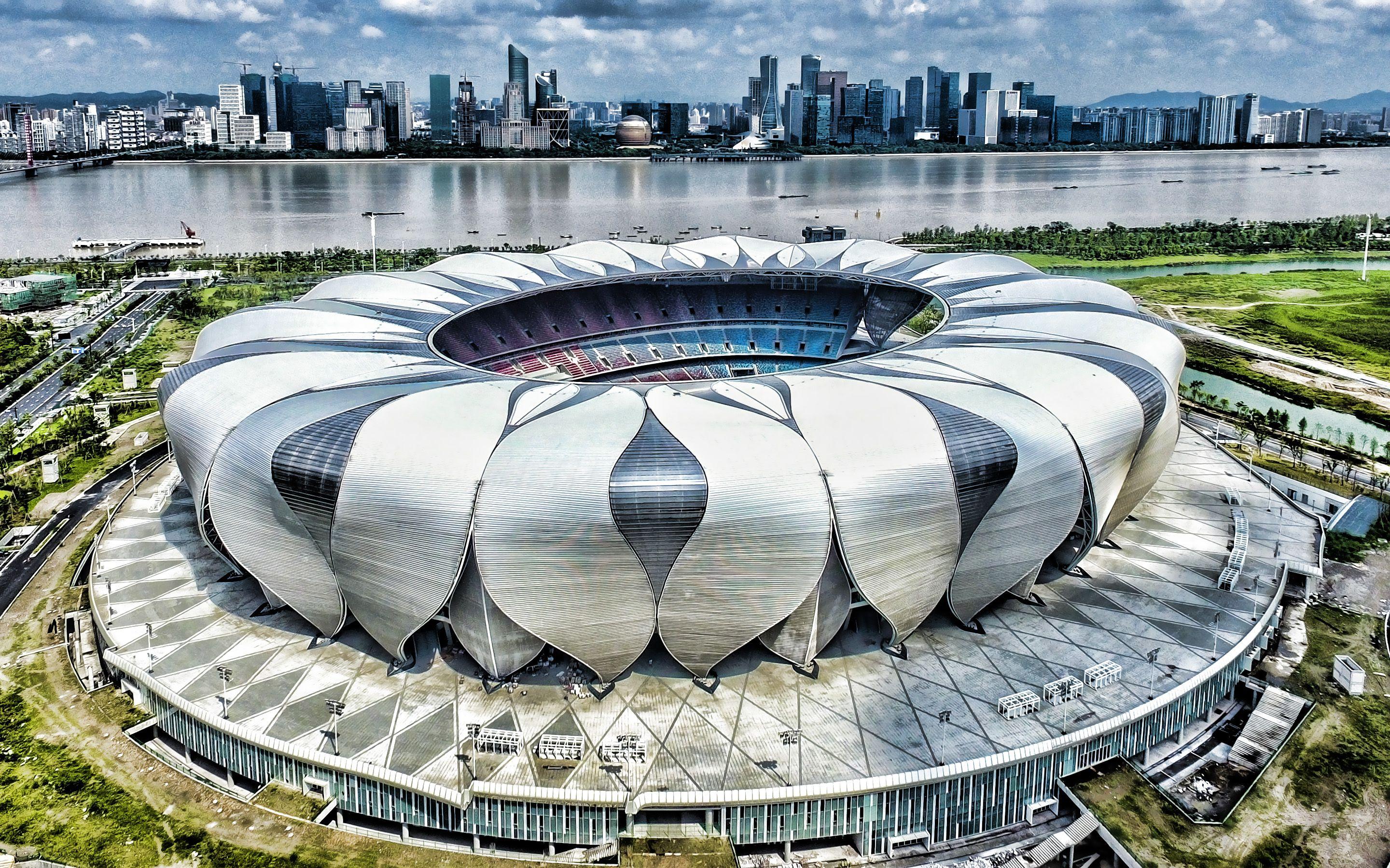 Стадионы китая. Ханчжоу 2022. Стадион в Ханчжоу. Стадион в Чанша Китай. Стадион чи Джонг в Шанхае архитектура.