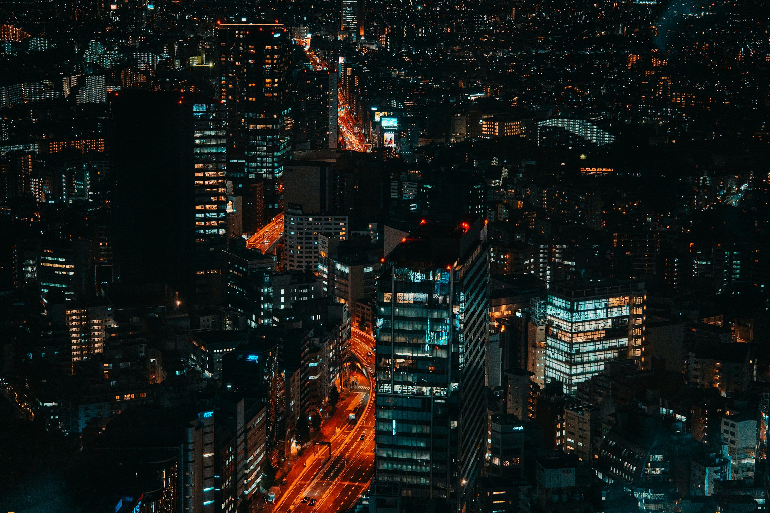 3000x2000 Aerial view of a city skyline at night photo