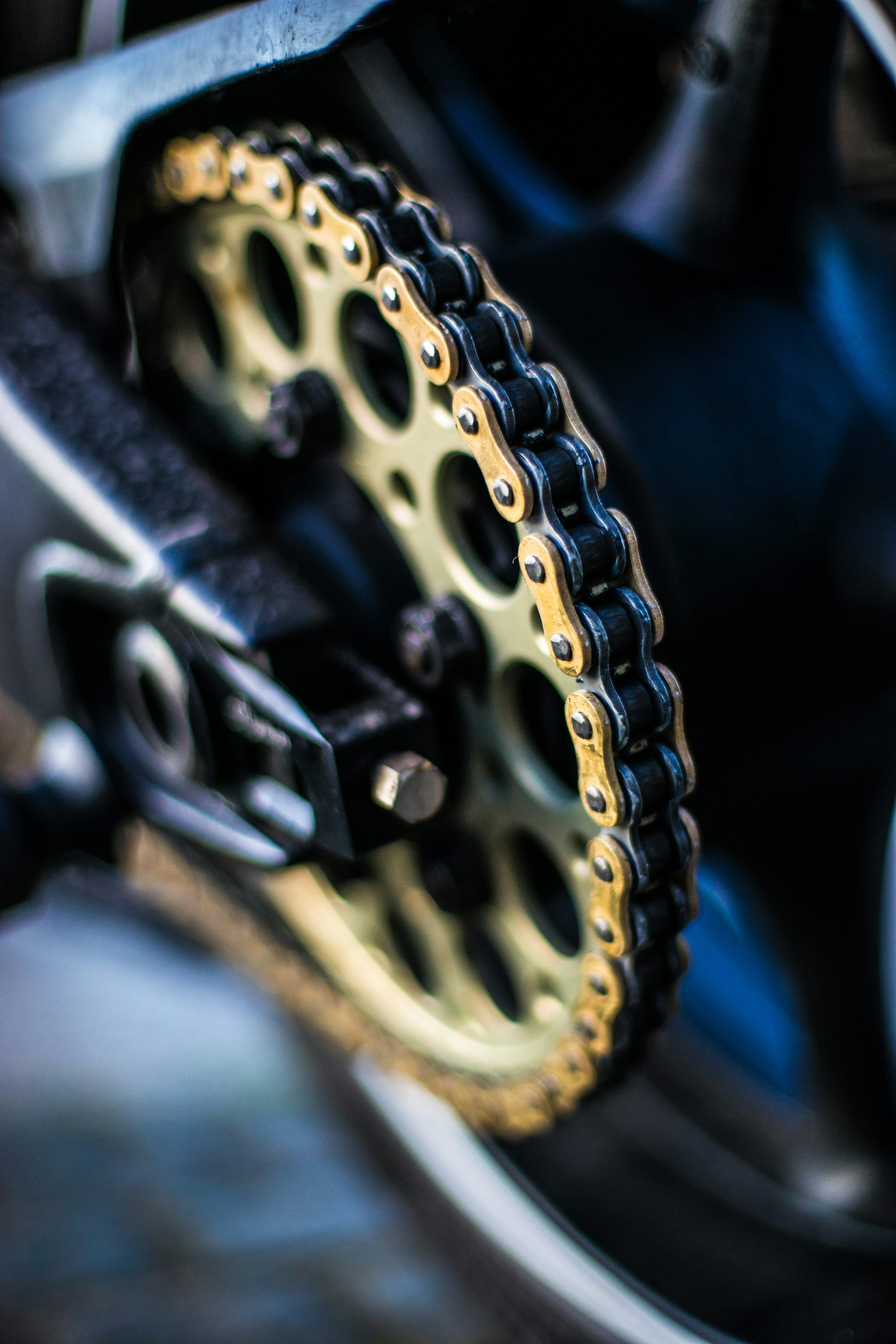 3000x4500 Selective focus photography of gold sprocket photo