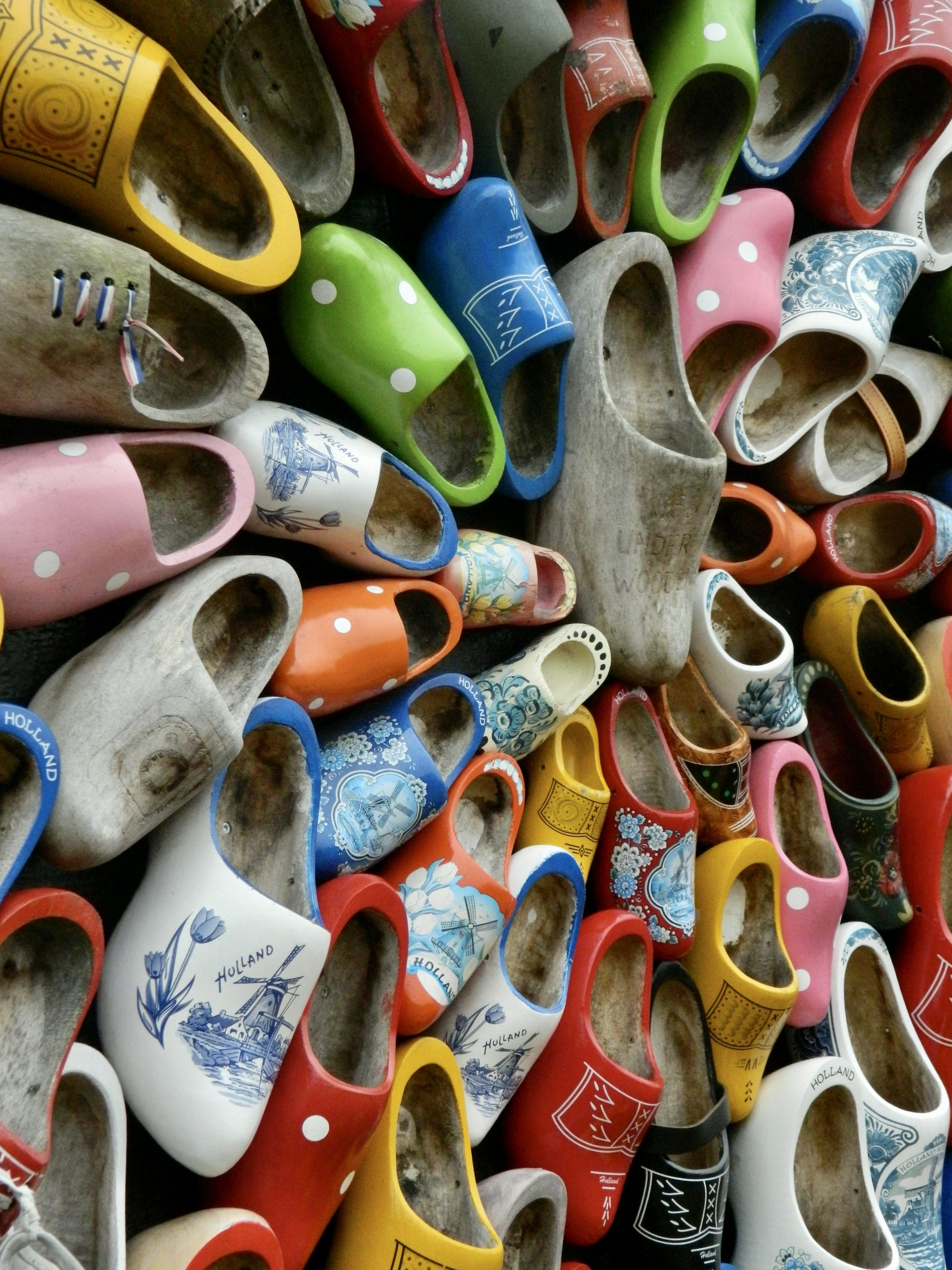 3000x4001 A pile of colorful shoes sitting next to each other photo